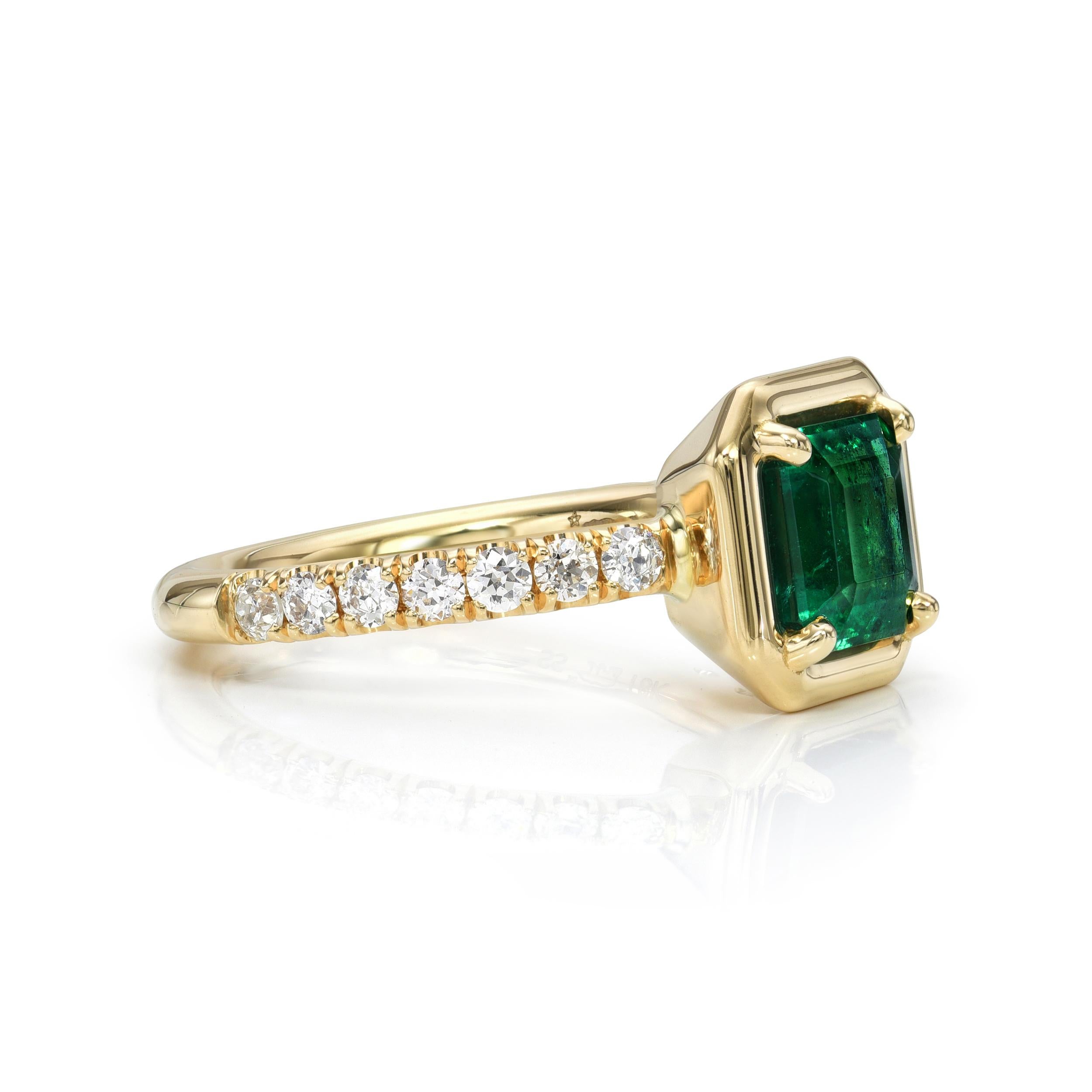 1.69ct GIA certified Zambian Asscher cut green emerald with 0.40ctw old European cut accent diamonds prong set in a handcrafted 18K yellow gold mounting.