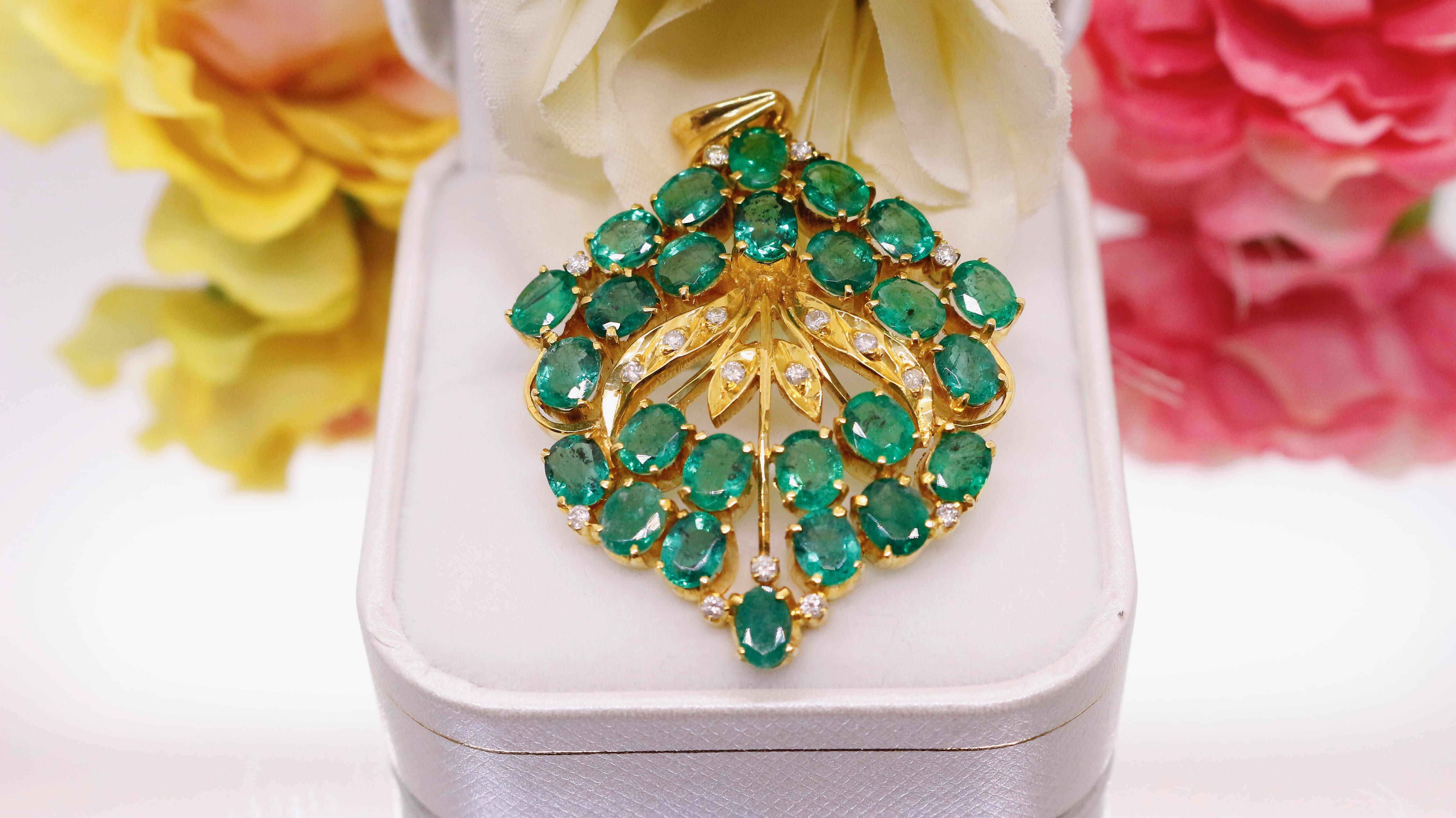 
Introducing our extraordinary Emerald Bouquet Design Pendant, a true masterpiece of vintage-inspired jewelry. This pendant is meticulously handcrafted in 18kt gold, showcasing the timeless elegance of yesteryears.

The centerpiece of this pendant