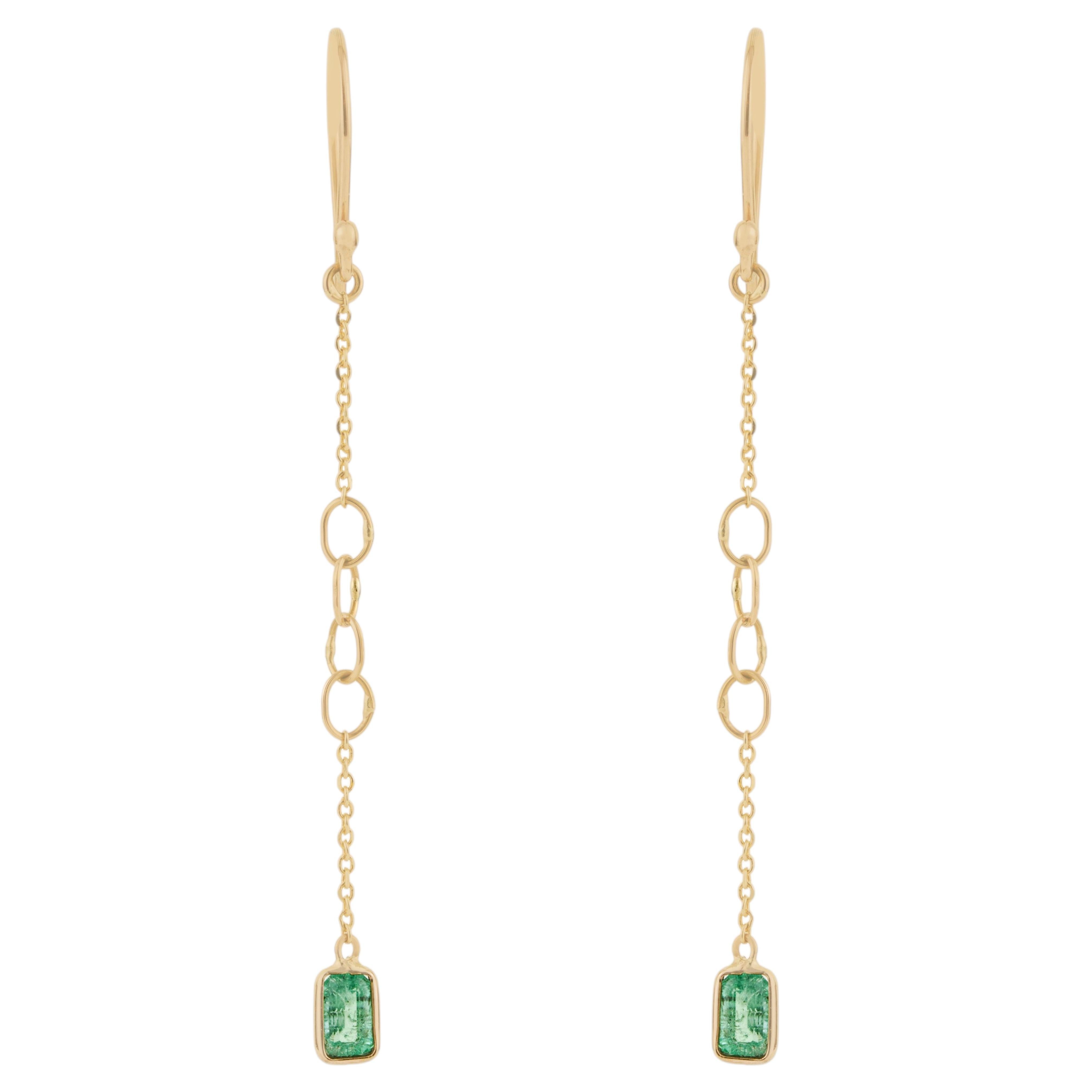 Handcrafted Emerald Drop Chain Earrings in 14K Yellow Gold with Fishhook Closure For Sale