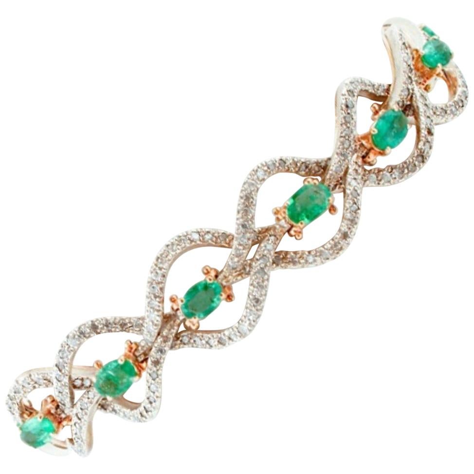 Handcrafted Emeralds and Diamonds, 9 Karat Rose Gold and Silver Retro Bracelet