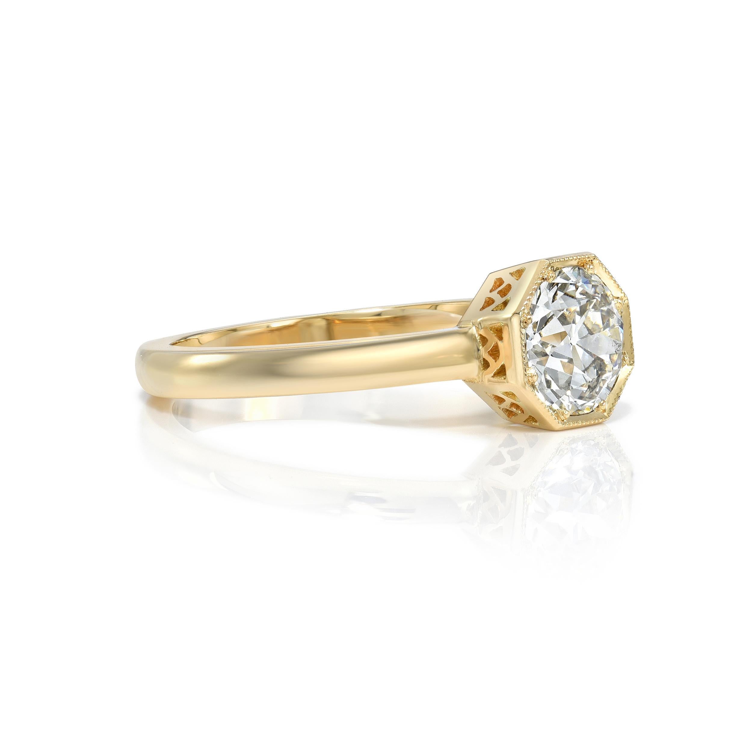 0.85ct H/SI2 GIA certified Old European cut diamond prong set in a handcrafted 18K yellow gold mounting.