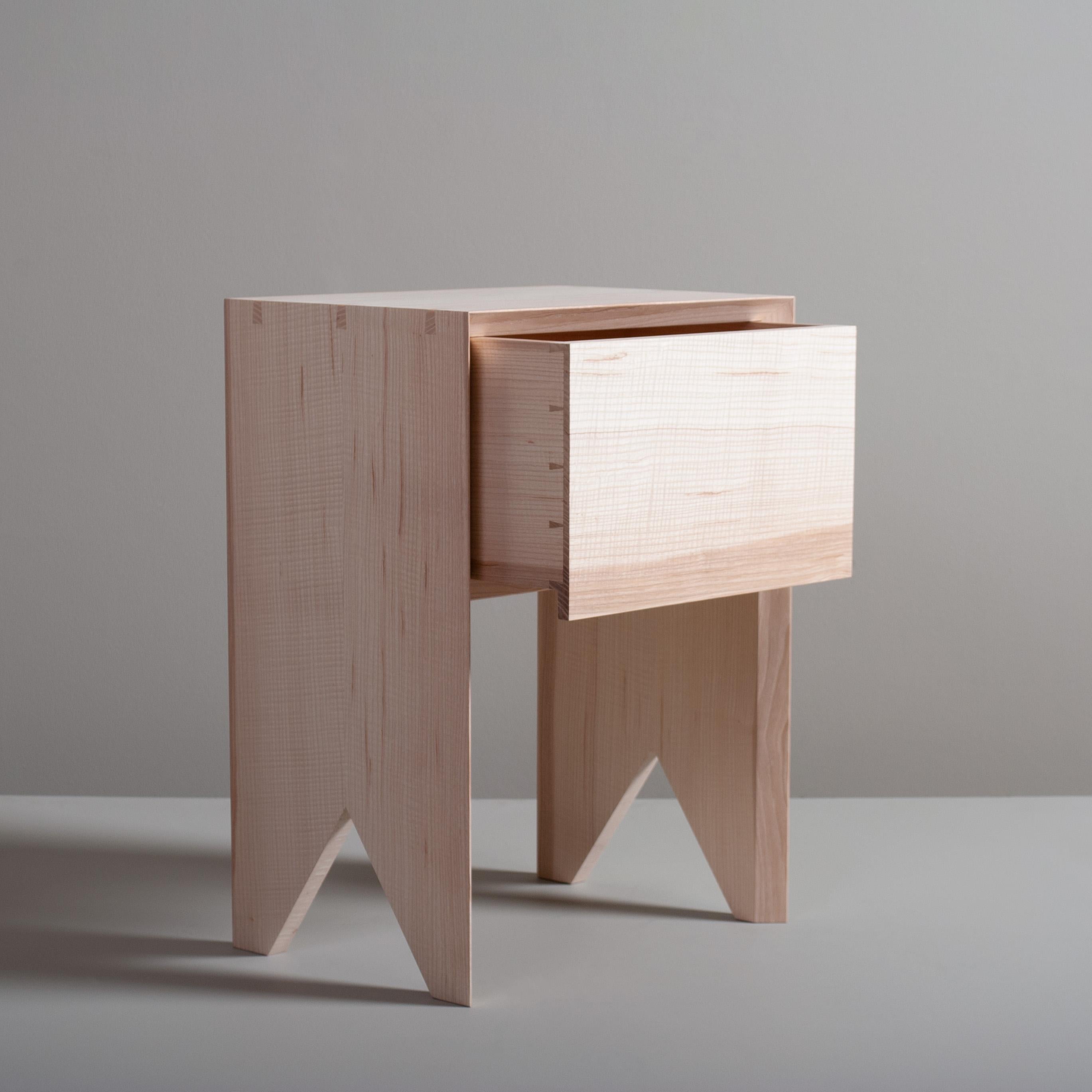 Ultra sleek contemporary hand-crafted English 'ripple' ash night stands with storage drawer. 
Designed with Asian minimalism in mind whilst highlighting the handmade construction details with exposed mitred key dovetail jointing. The strict clean