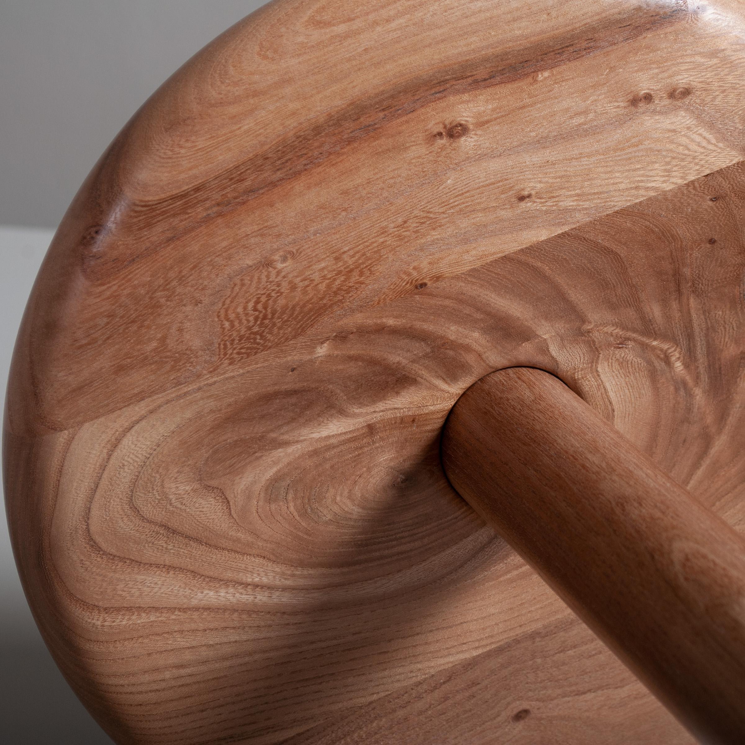 Beautifully hand turned and handcrafted English Elm side table in the bold modernist design. Balanced form and scale. The centre column neatly enters the base in a precisely indented turned fitting technique. This is a bespoke piece of fine quality,
