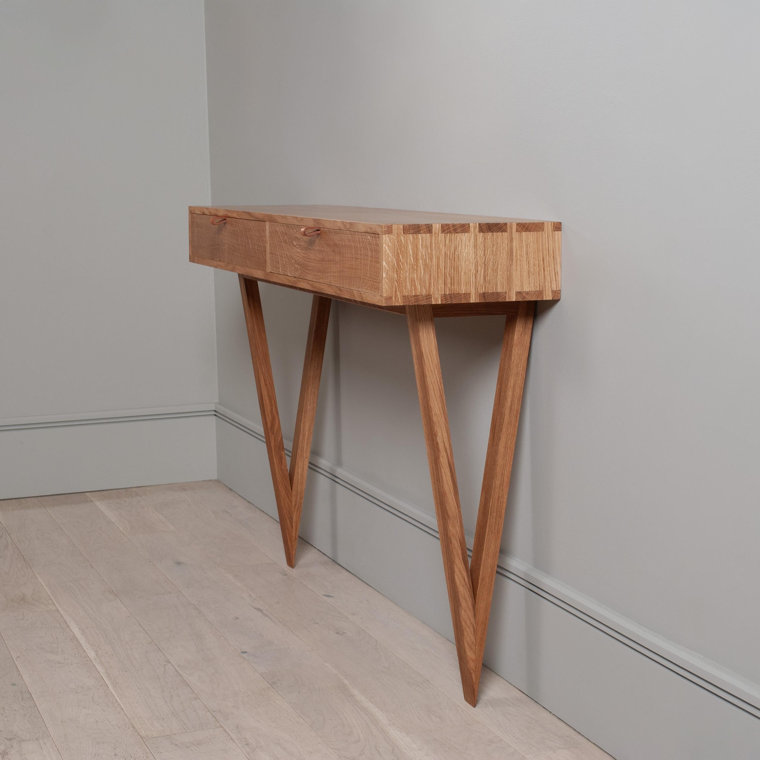 Modernist English oak 2 drawer console or vanity table with matching 'furrow' mirror - designed and completely handcrafted in England using traditional cabinetry techniques. Skilfully constructed from the finest prime English oak. Hand dovetailed