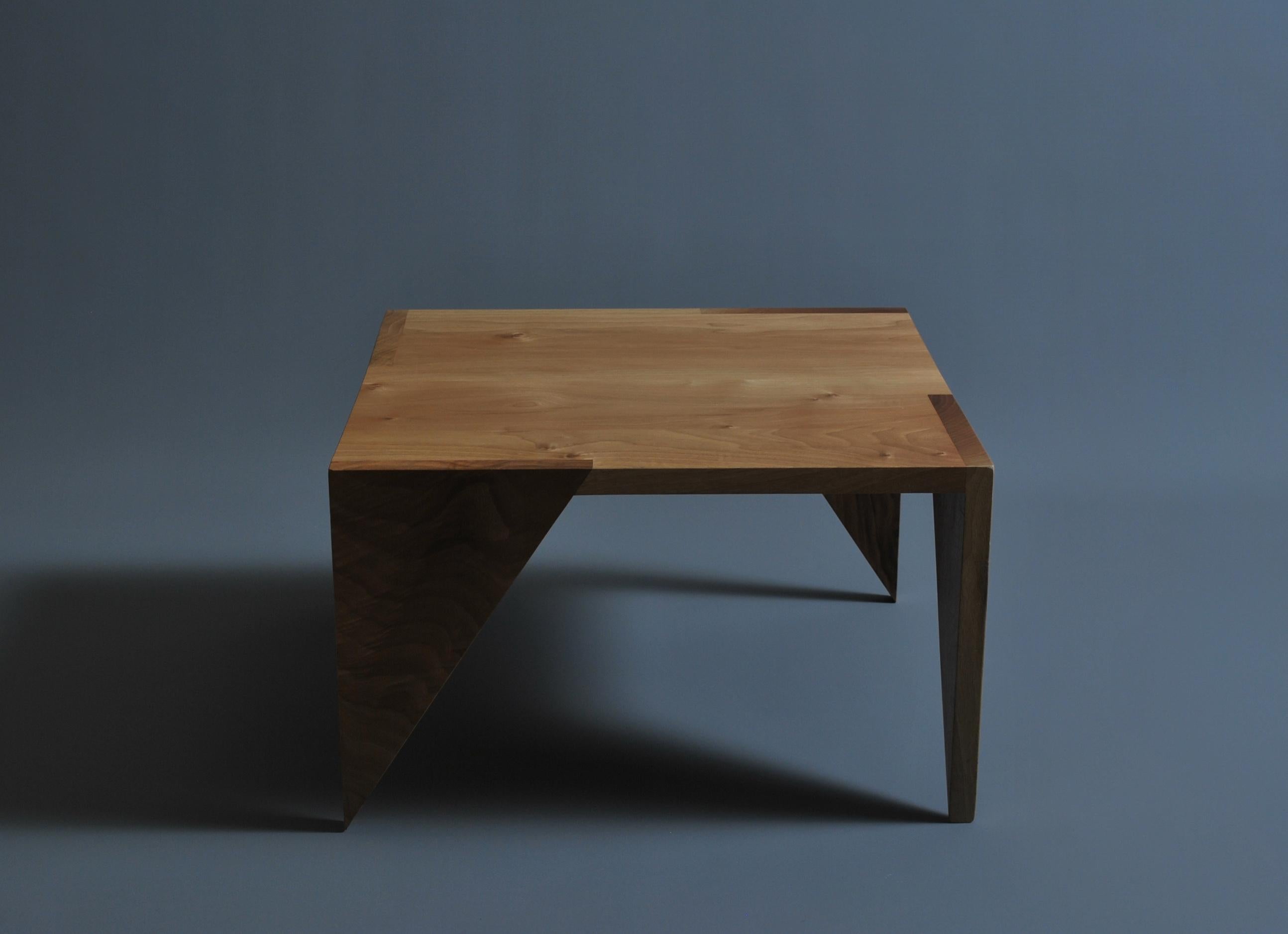 Handcrafted from the finest quality English walnut. These Postmodernist tables are acutely eye-catching but practical pieces of furniture. Bespoke handmade by master craftsmen in England and finished with water and stain resistant natural oil