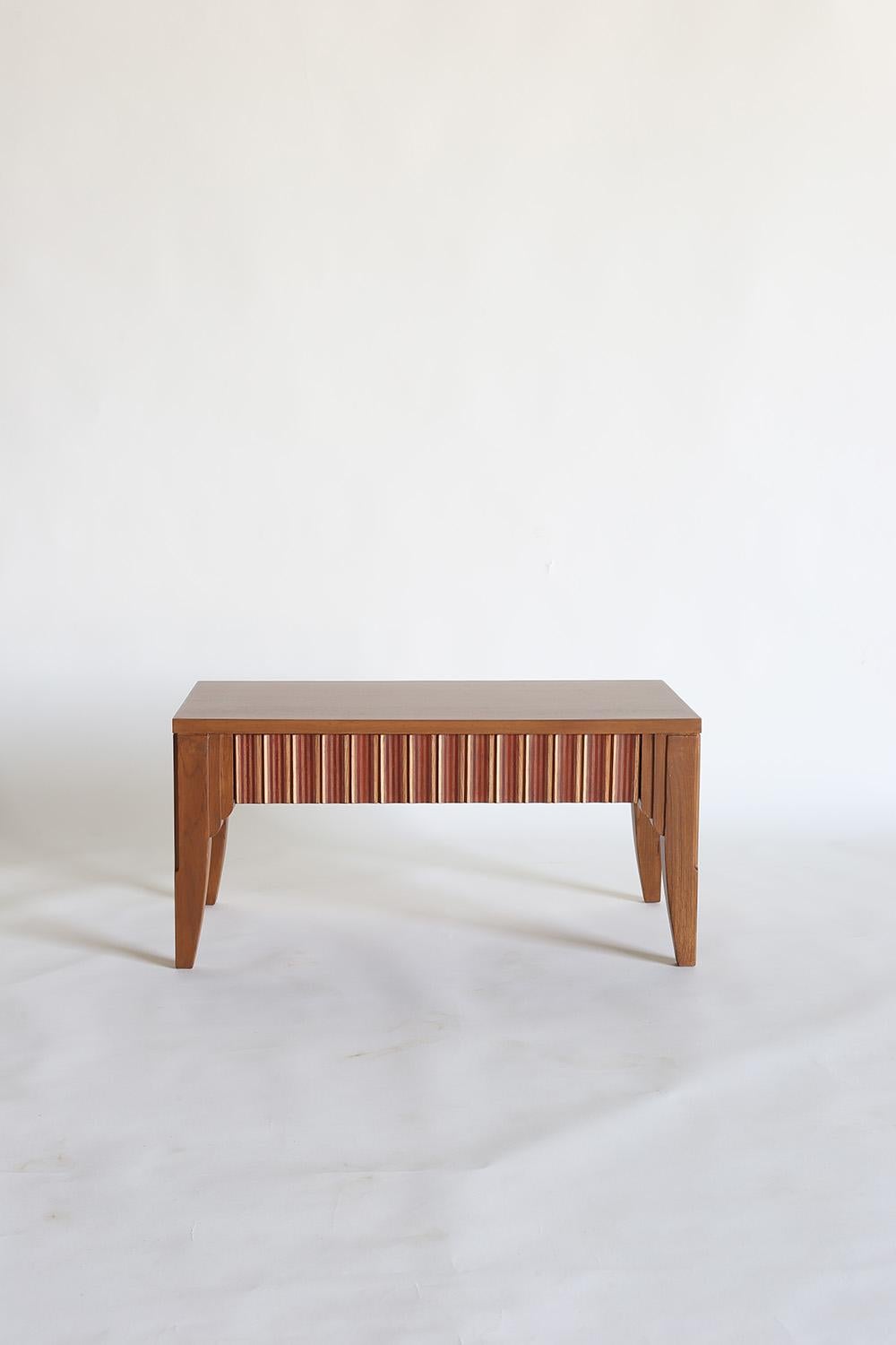 The Epoch side table captures the heart of enduring design that can span decades. Handcrafted in Gujarat, India, from white oak comes a minimalist silhouette with fine inlaid woodwork detailing. With each piece, you'll find an individual grain and