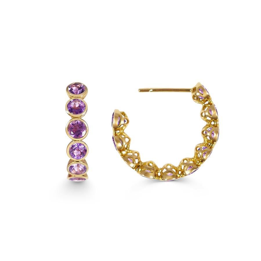 Handcrafted Eternity Hoop Earrings in Amethyst and 18 Karat Yellow Gold. Our twist on the Eternity rings - representing everlasting love. Our Eternity hoops are a Romantic statement set in our signature hand pierced lace.

Once considered of equal