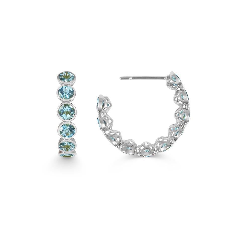 Handcrafted Eternity Hoop Earrings in Aquamarine and 18 Karat White Gold. Our twist on the Eternity rings - representing everlasting love. Our Eternity hoops are a Romantic statement set in our signature hand pierced lace.

Just like Emeralds,