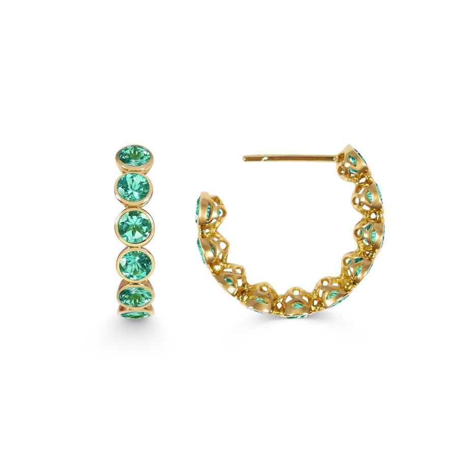 Handcrafted Eternity Hoop Earrings in Emerald and 18 Karat Yellow Gold. Our twist on the Eternity rings - representing everlasting love. Our Eternity hoops are a Romantic statement set in our signature hand pierced lace.

Emeralds are the most