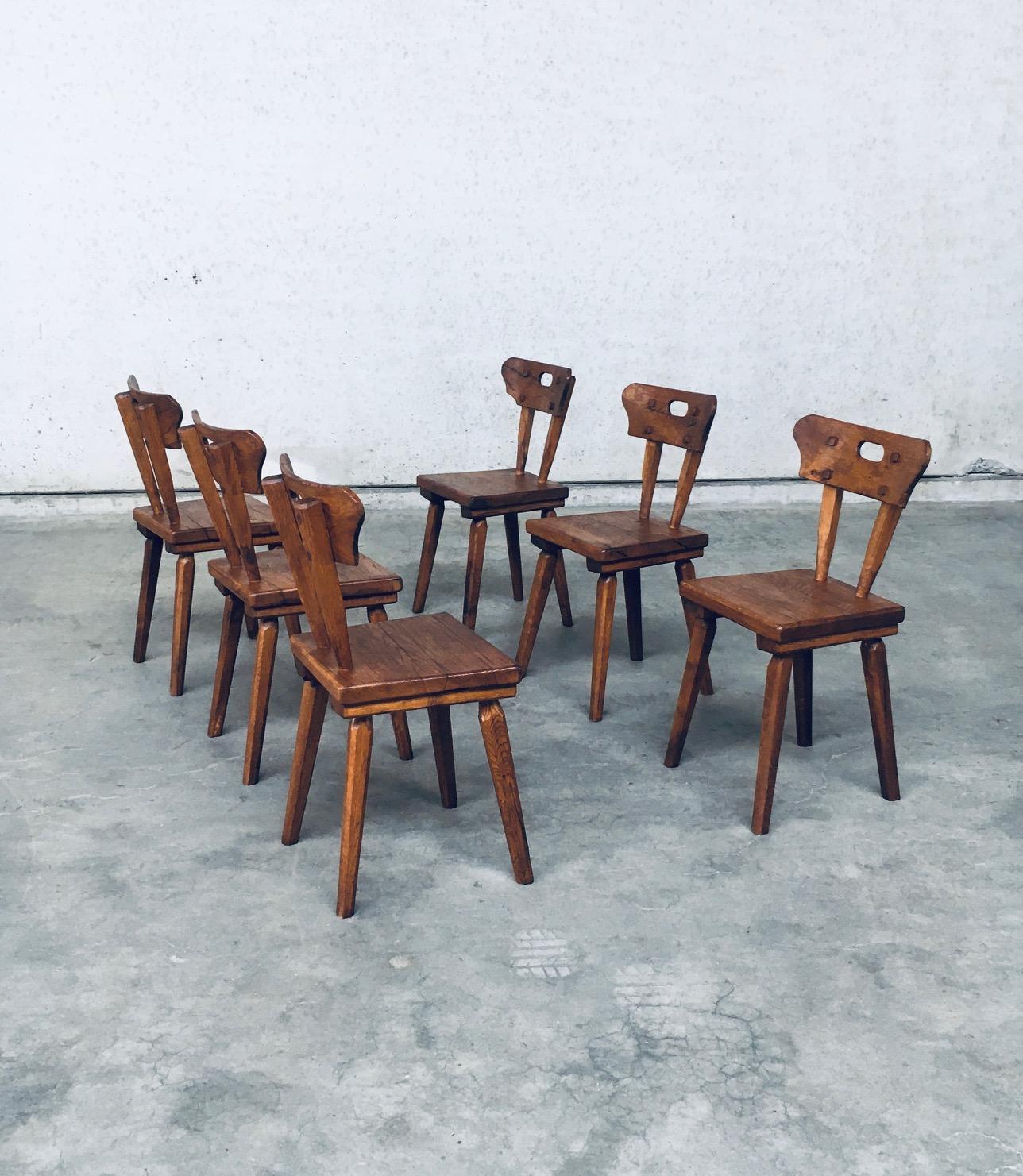 Mid-20th Century Handcrafted Folk Art Rustic Oak Dining Chair Set, France, 1940s For Sale