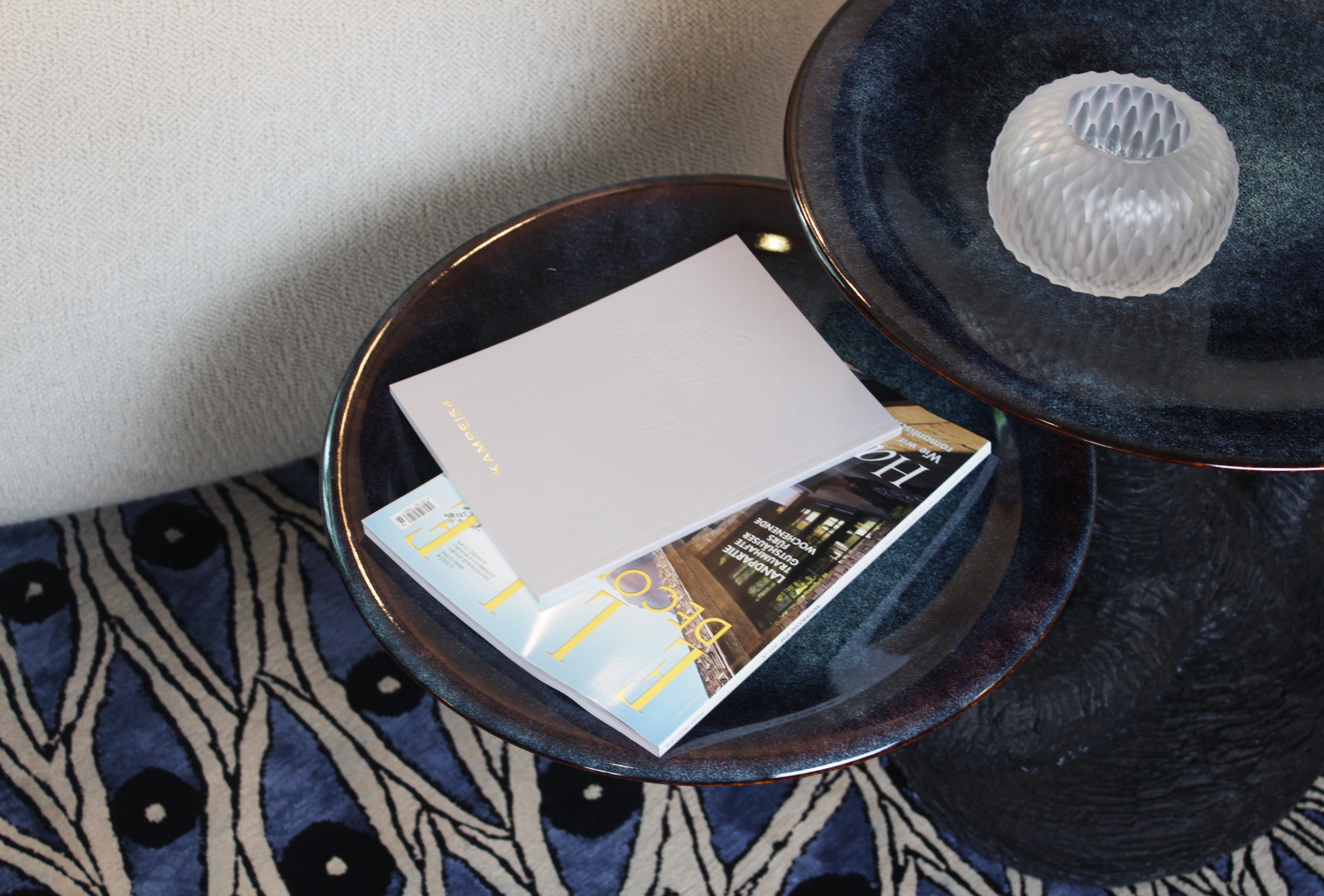 Kinoko is more than a single object; it is a series of side tables exploring diverse interpretations of mushrooms and their organic presence in interior spaces. Inspired by the question of how we perceive nature through our own perspective, the