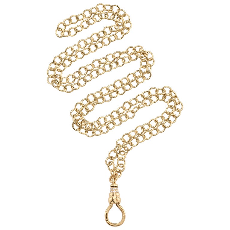 Handcrafted gold-link chain with diamond accents on clasp
