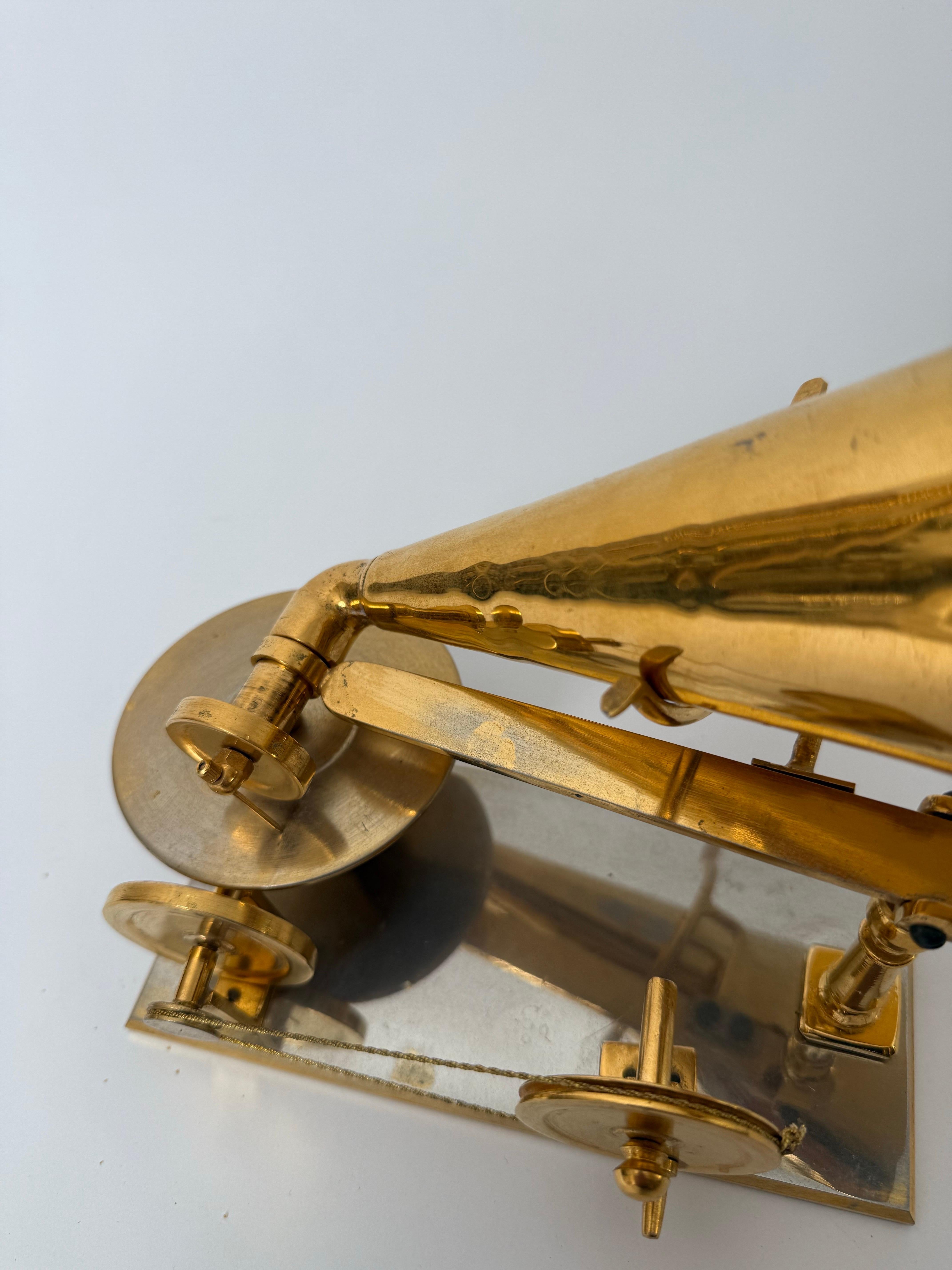 A special  musical design object for lovers of music and transforming technology. This is a handcrafted model of the first gramophone, elaborately crafted and true to detail despite its simplicity. Whether you place this work of art in a display