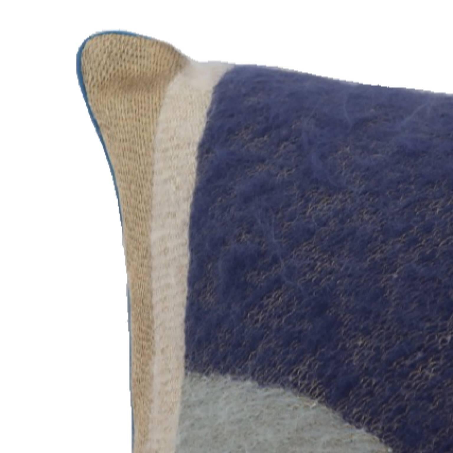 Handcrafted pillow embroidered with mohair yarn and gold metallic threads.