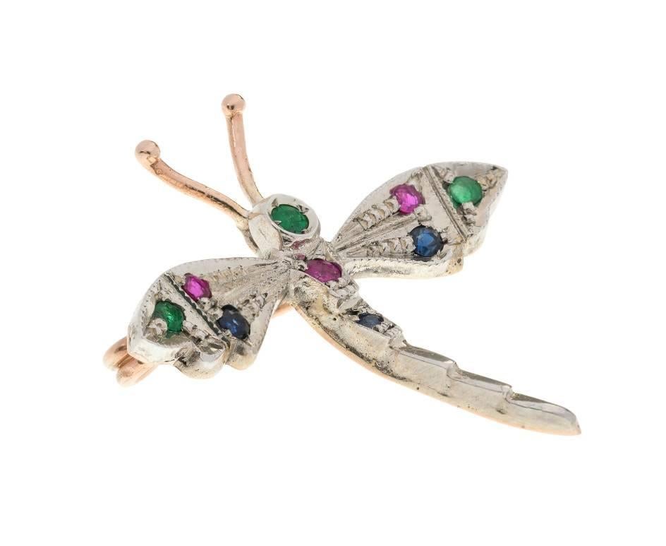 GEMMOLOGIST'S NOTES
This beautifully crafted dragonfly brooch handcrafted by third generation Italian goldsmiths in Naples, Italy

Inspired by the Victorians, this fabulous dragonfly is encrusted with ruby, emerald and sapphires, set in white gold,
