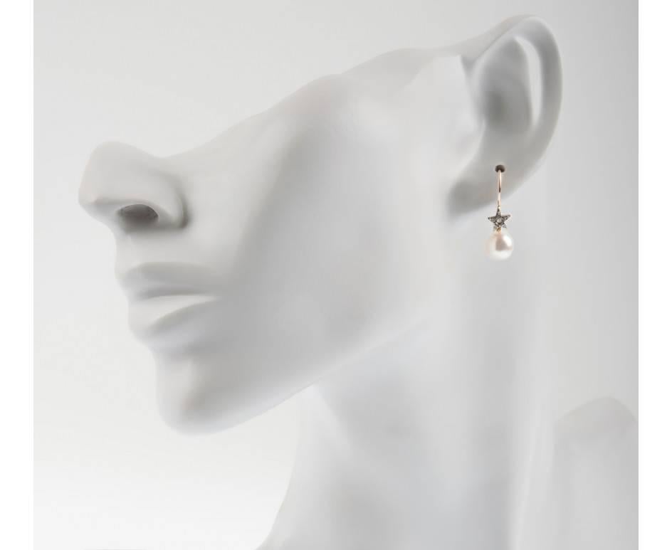 GEMMOLOGIST'S NOTES
This beautifully crafted ladies cultured pearl and diamond cluster earrings, handcrafted by third generation Italian goldsmiths in Naples, Italy. The perfect pair for a brides special day. 

Each features a 8mm luxurious cultured