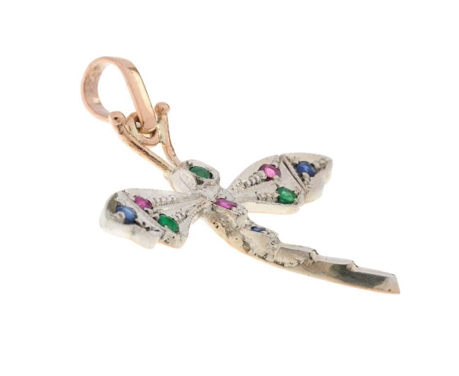 GEMMOLOGIST'S NOTES
This beautifully crafted dragonfly pendant handcrafted by third generation Italian goldsmiths in Naples, Italy

Inspired by the Victorians, this fabulous dragonfly is encrusted with ruby, emerald and sapphires, set in white gold,