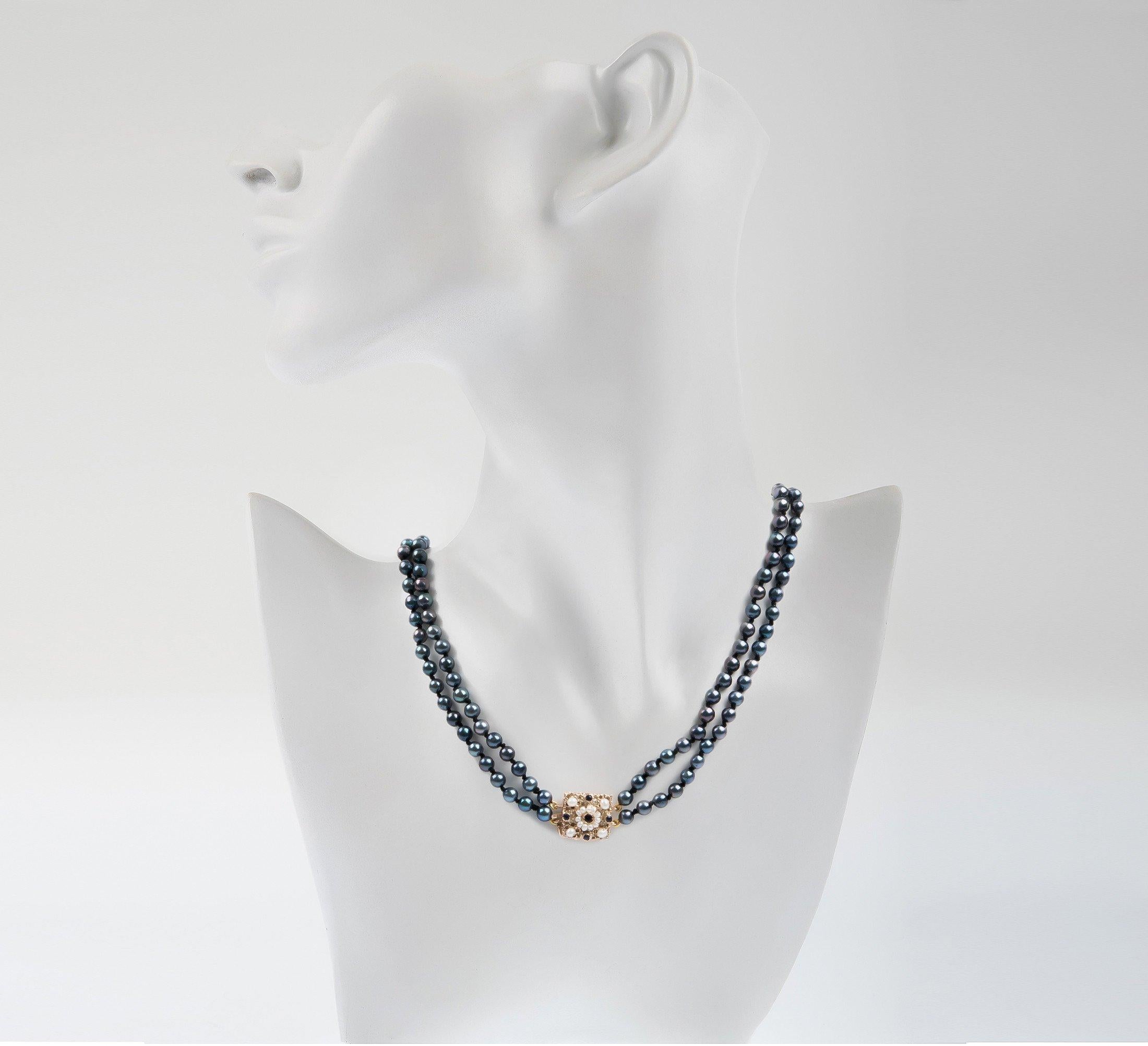 This breathtaking necklace, comprising of over one hundred pearls, with a fabulous handcrafted floral clasp set with tiny seed pearls. The pearls are round and well matched, measuring 4.5mm with beautiful blue and grey hues.

SPECIFICATION
Weight