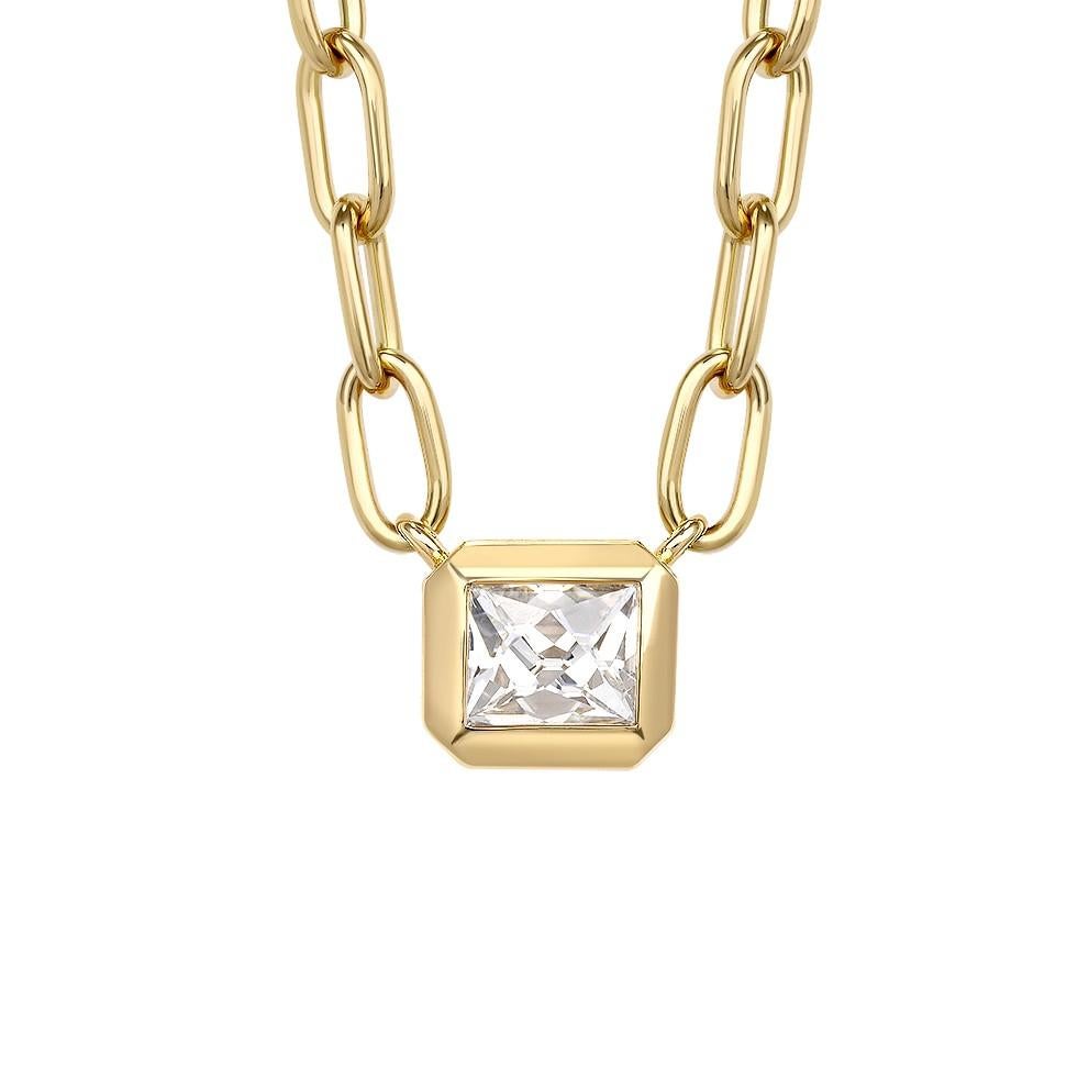 0.92ct F/VS2 GIA certified French cut diamond bezel set on a handcrafted 18K yellow gold pendant necklace.

Necklace measures 17