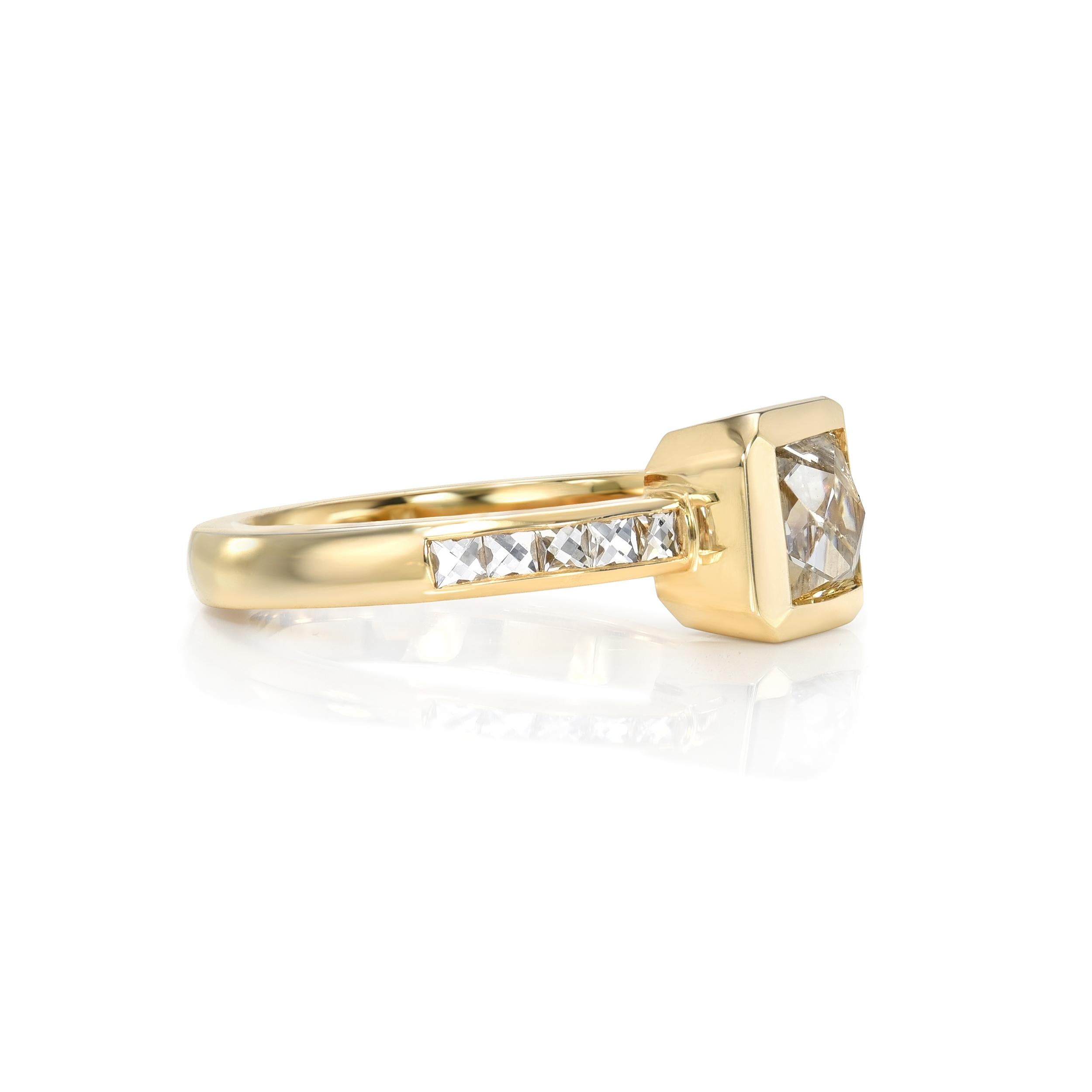 1.24ct G/I1 GIA certified French cut diamond with 0.25ctw French cut accent diamonds set in a handcrafted 18K yellow gold mounting.

 
