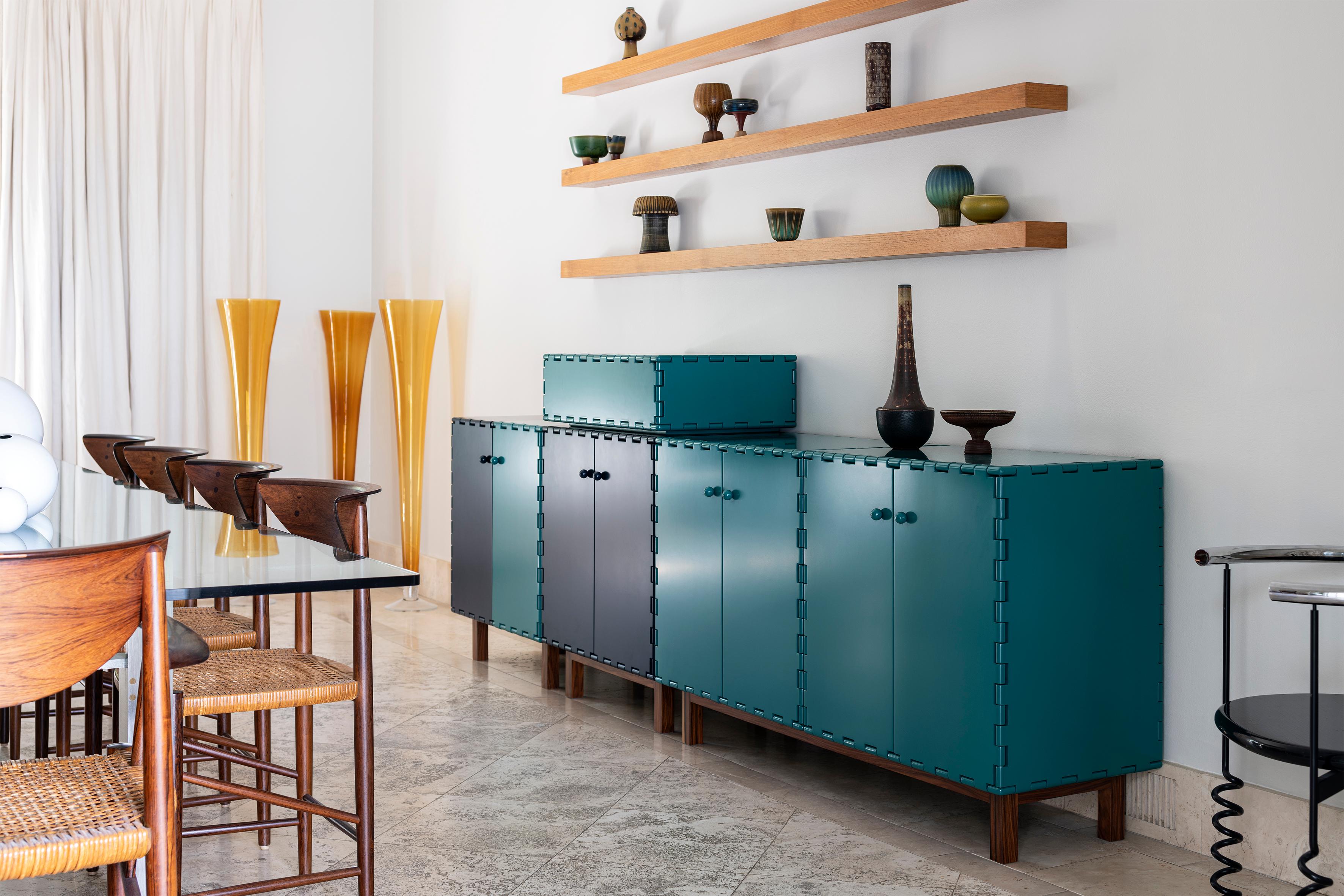 Handcrafted 4 pieces sideboard cabinet in lacquered wood. The lacquer color highlights the simplicity of the design details. The modular quality of the collection allow each cabinet to be combine with other pieces within the collection to create