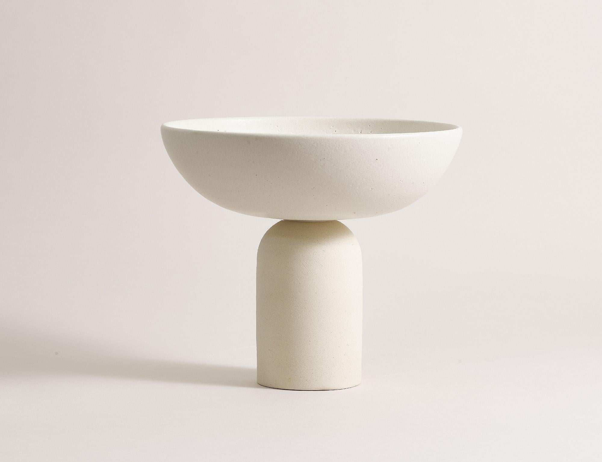 Handcrafted large 015 coupe by Lovebuch
Dimensions: Ø 22 x H 20 cm
Materials: Sandstone, handcrafted piece

Katia works with wood and clay, these raw, powerfully expressive materials are shaped to create a poetry of objects that inhabit our