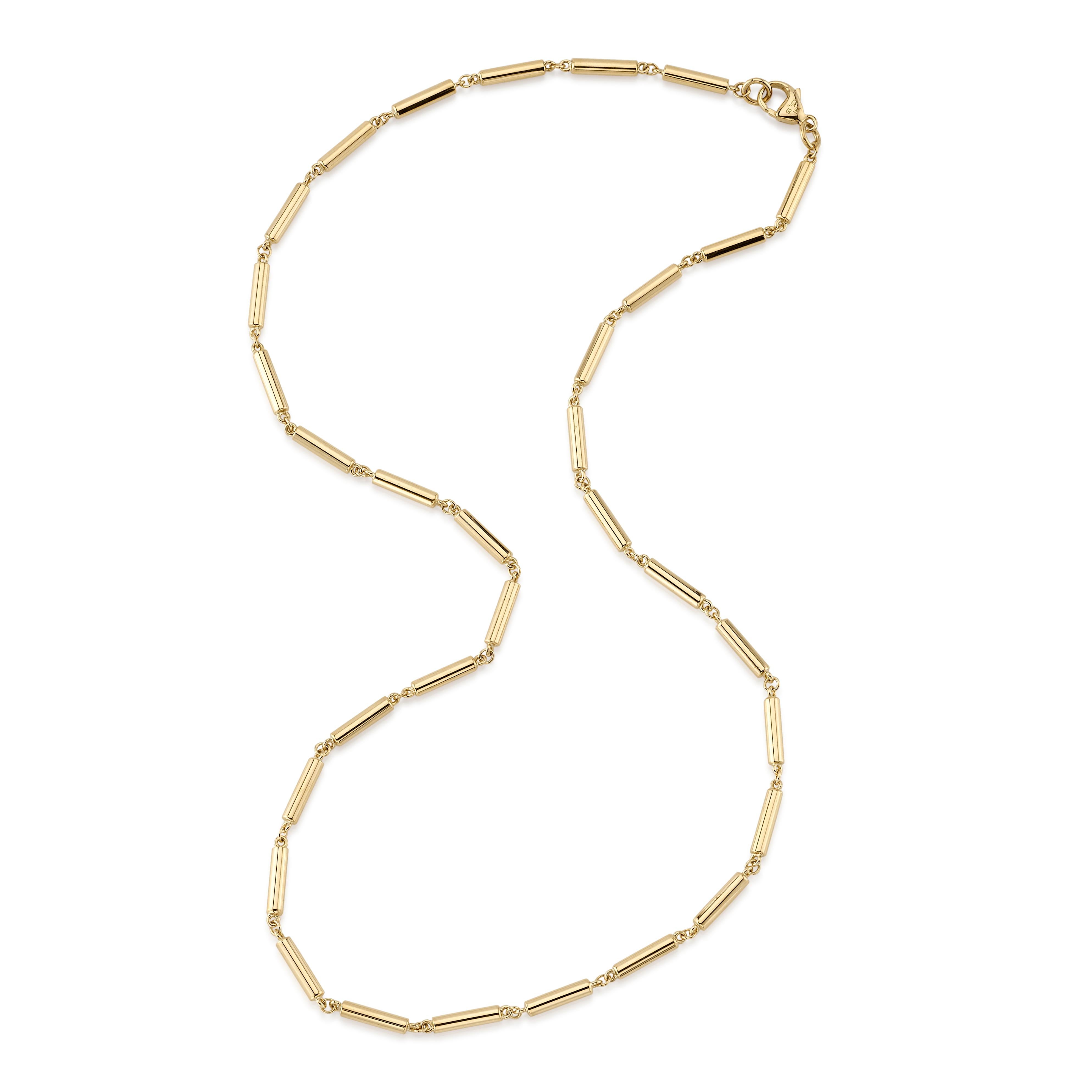 Handcrafted 18K yellow gold cylindrical link necklace. Price does not include charms.

Available in 17