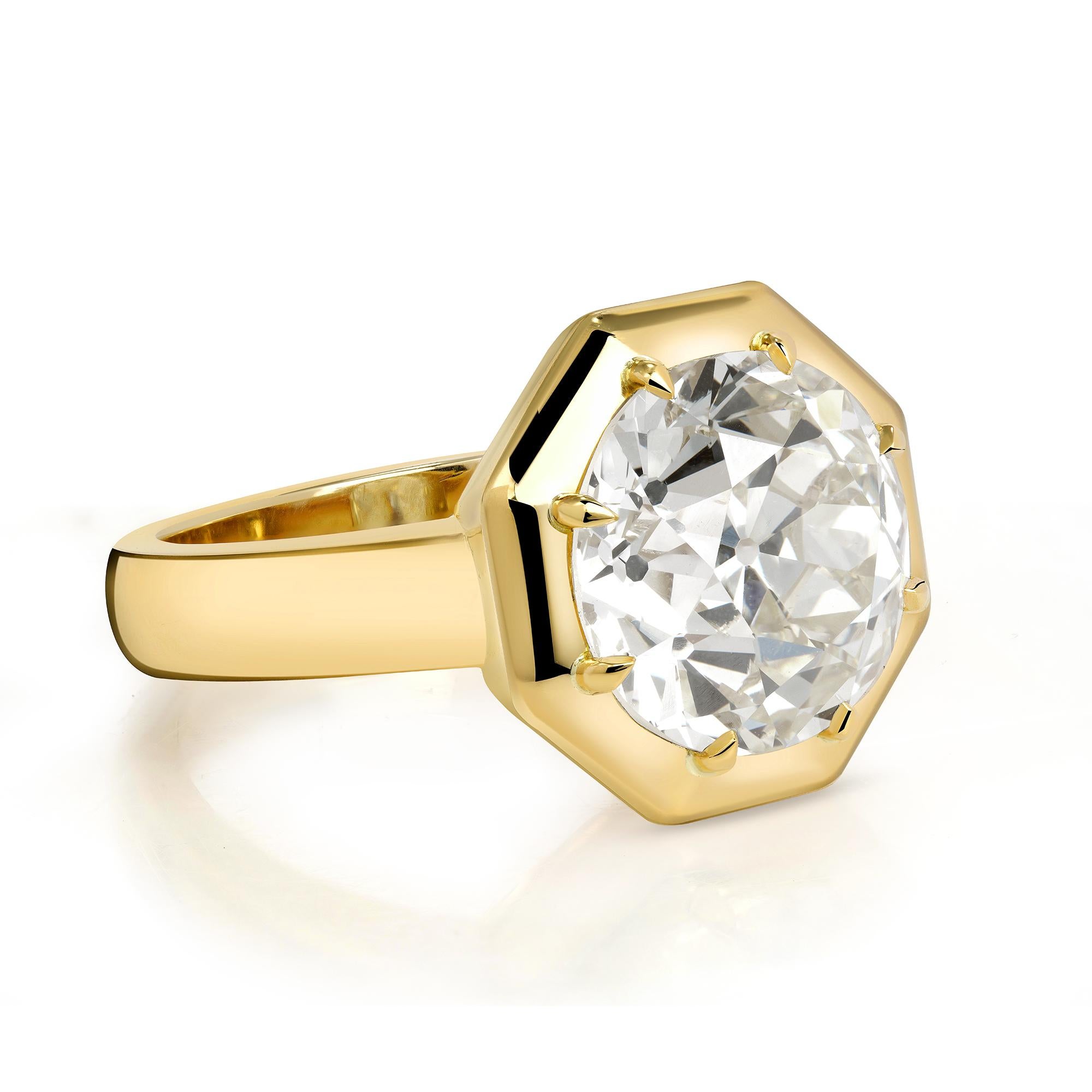 5.02ct M/VS1 GIA certified old European cut diamond prong set in a handcrafted 18K yellow gold mounting.
