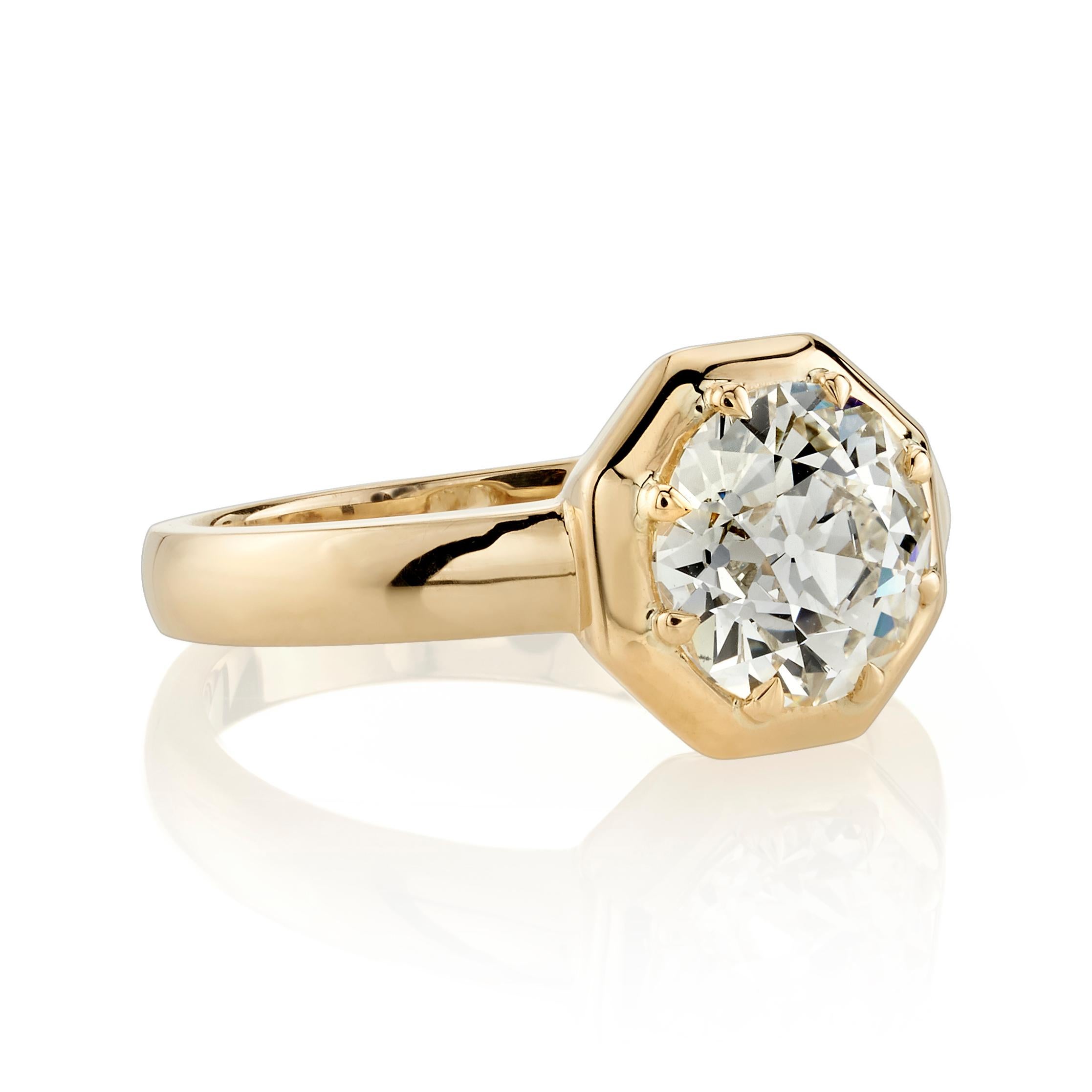1.99ct O-P/VS1 GIA certified old European cut diamond prong set in a handcrafted 18K yellow gold mounting.