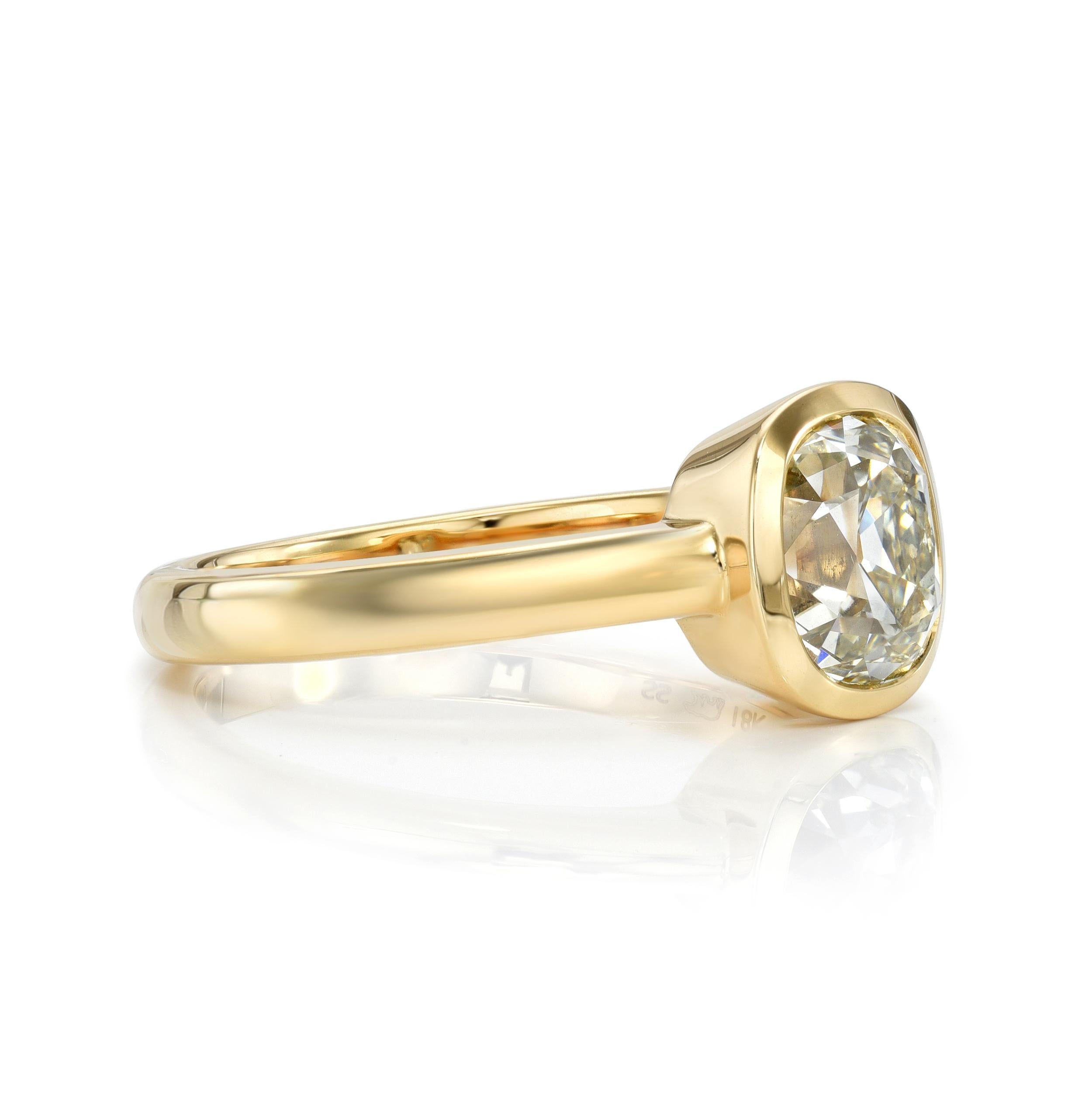 1.68ct L/SI1 GIA certified antique cushion cut diamond bezel set in a handcrafted 18K yellow gold mounting.