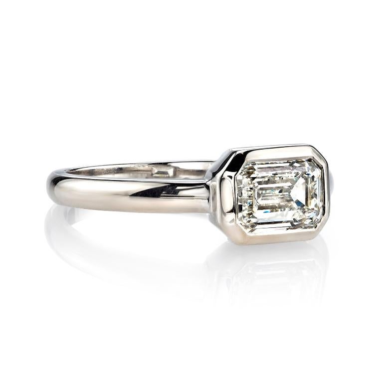 1.20ct L/VVS1 GIA certified emerald cut diamond set in a handcrafted 18K champagne white gold mounting.