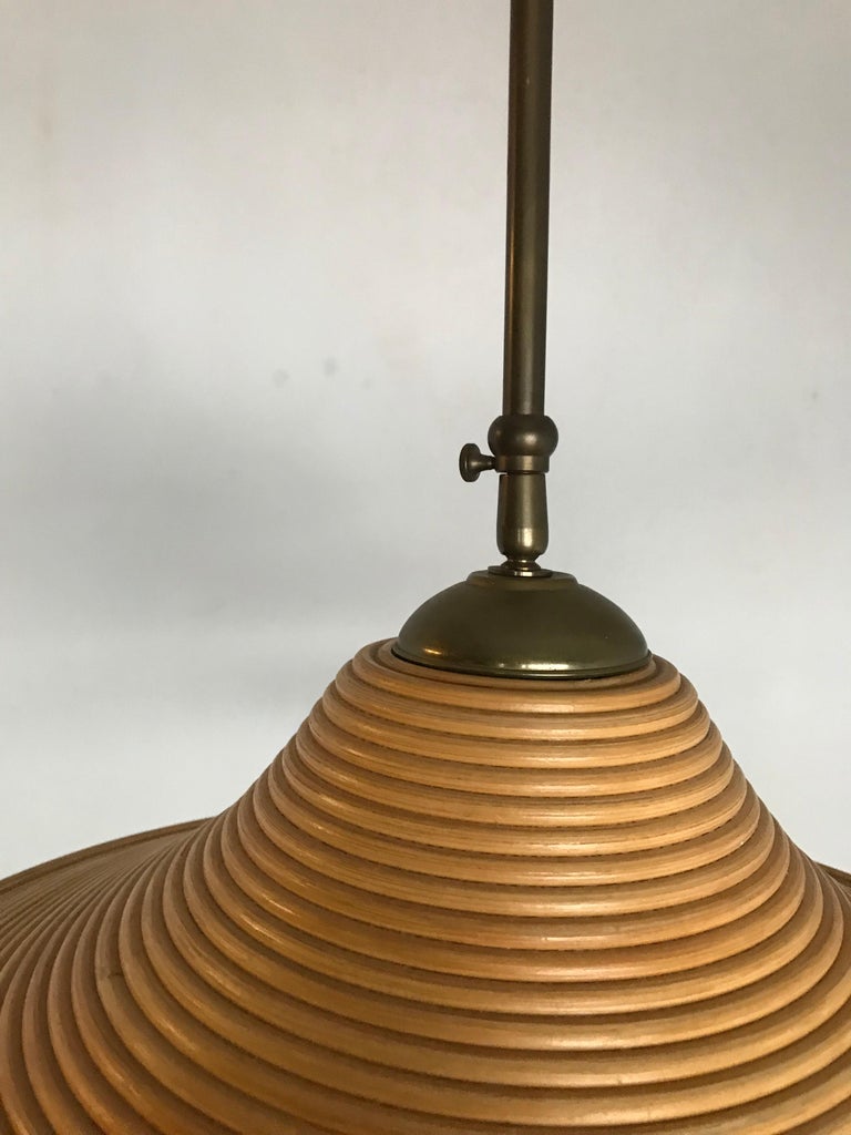 Handcrafted MidCentury Modern Rattan Pendant Light w. Adjustable Brass Down Rod at 1stDibs