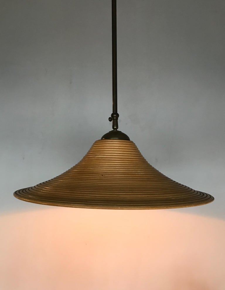 Handcrafted MidCentury Modern Rattan Pendant Light w. Adjustable Brass Down Rod at 1stDibs