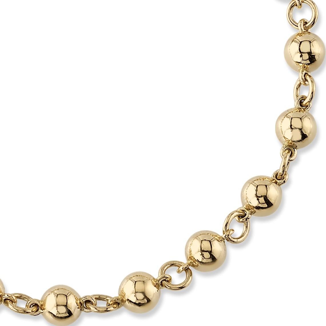 Handcrafted 18K yellow gold large rosary bead bracelet. Beads measure 5mm in diameter.

Bracelet measures 7.5
