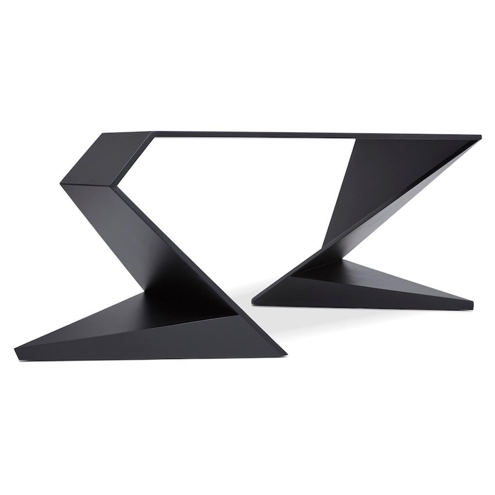 Handcrafted in wood, the minimalist flow console is available in a variety of lacquered finishes. The form symbolizes power, simplicity and elegance at the same time. The design demonstrates the dynamics of equilibrium, gravity, and mass. A dynamic