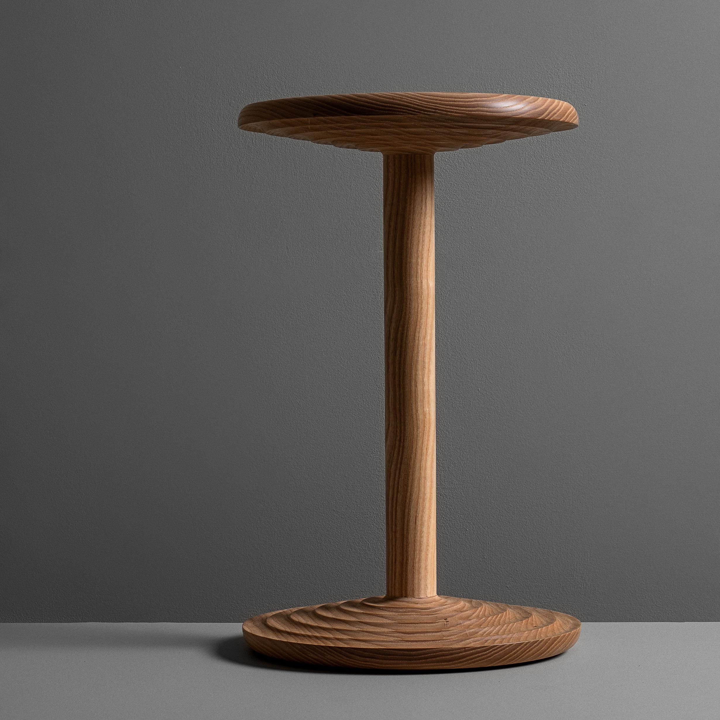 Beautifully hand-turned and handcrafted white ash rippled side table in the modernist design. Perfect in form and scale. This is a bespoke piece of fine quality, handmade by a master-craftsman in solid English Ash.

We design bold and distinctive