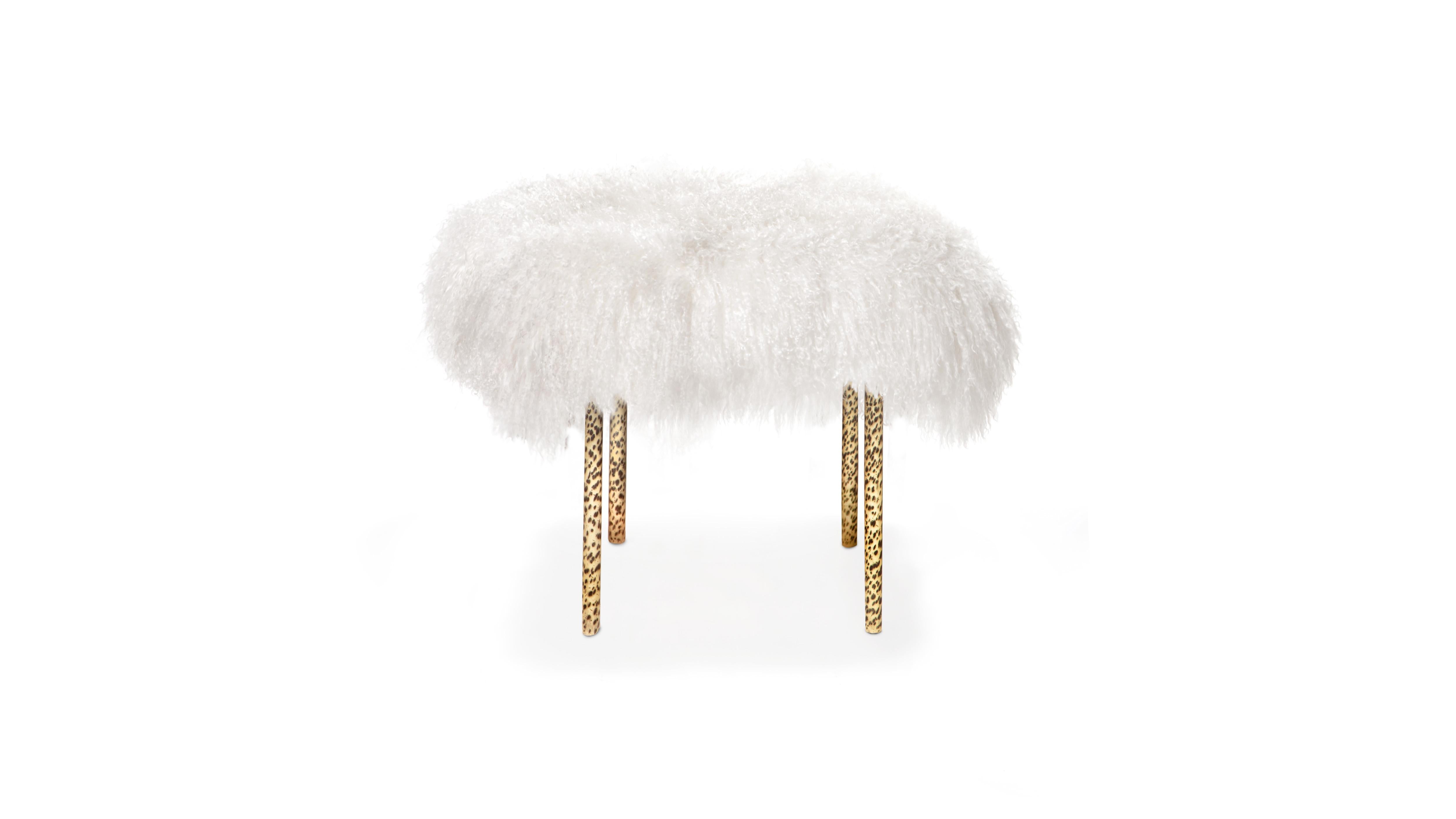 An excellent accent piece for the living or bedroom space, this Mongolian Fur topped stool sits upon handcrafted hammered and patinated legs.
Can also be produced with smooth polished or brushed brass legs and alternate lamb fur colors.
