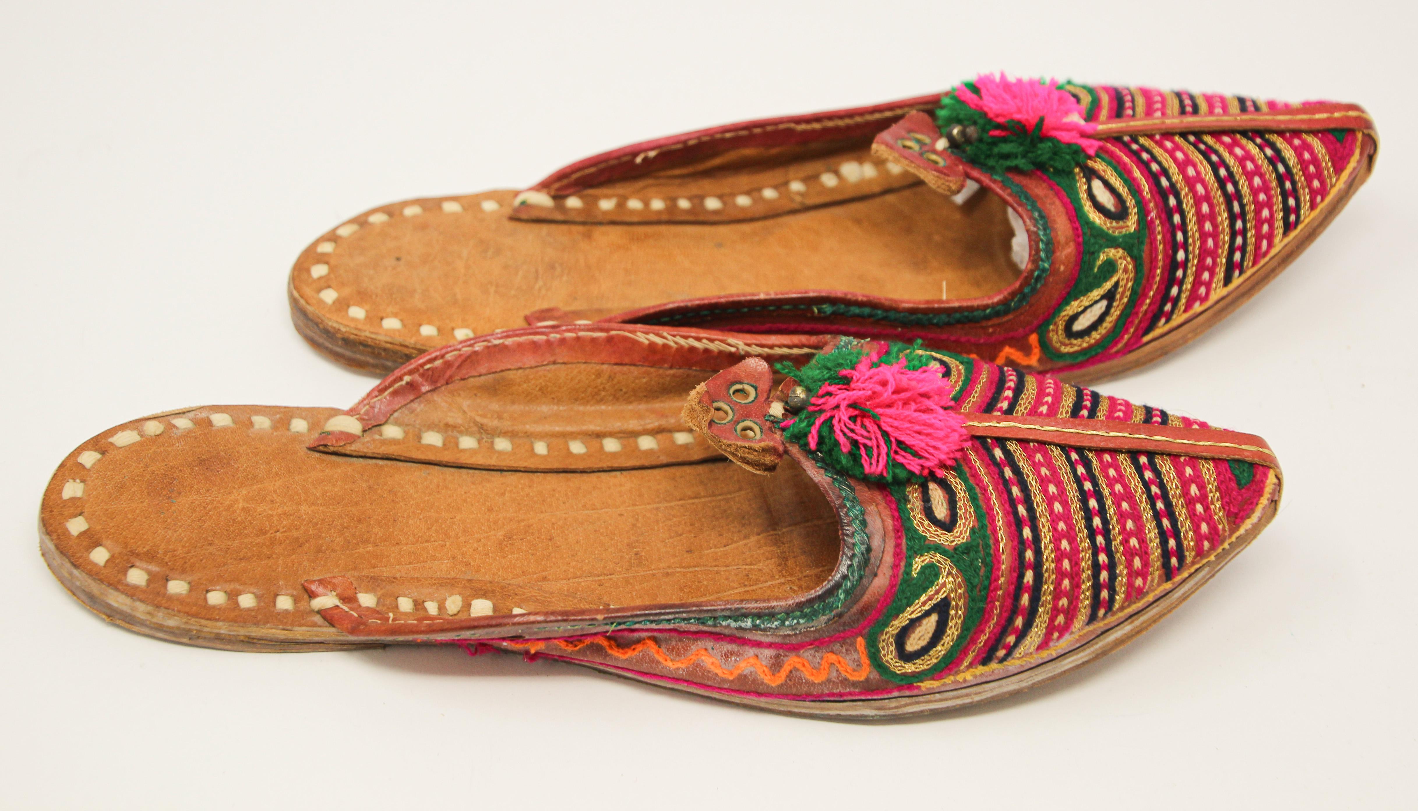 Vintage Moorish Turkish ethnic leather slippers with intricate gold embroideries pointed toe.
Leather hand sewn and embroidered with colorful thread.
Great pair of exotic ethnic flat loafers, slippers to use for your next Moroccan, Arabian night