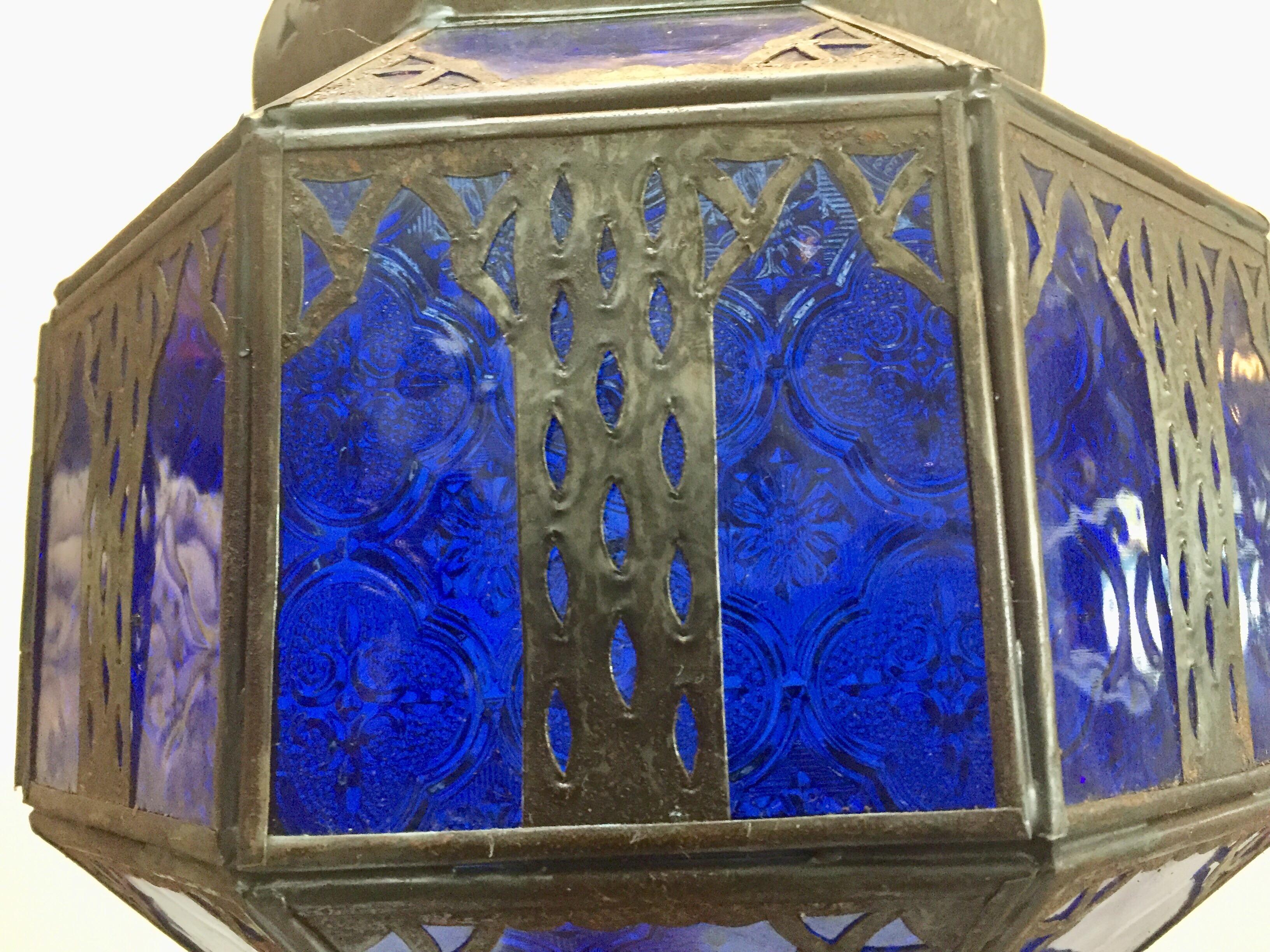 Hand-Crafted Handcrafted Moroccan Metal and Blue Glass Lantern, Octagonal Shape For Sale