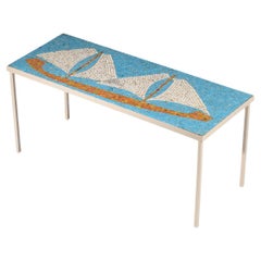 Handcrafted mosaic coffee table decorated with a sailboat