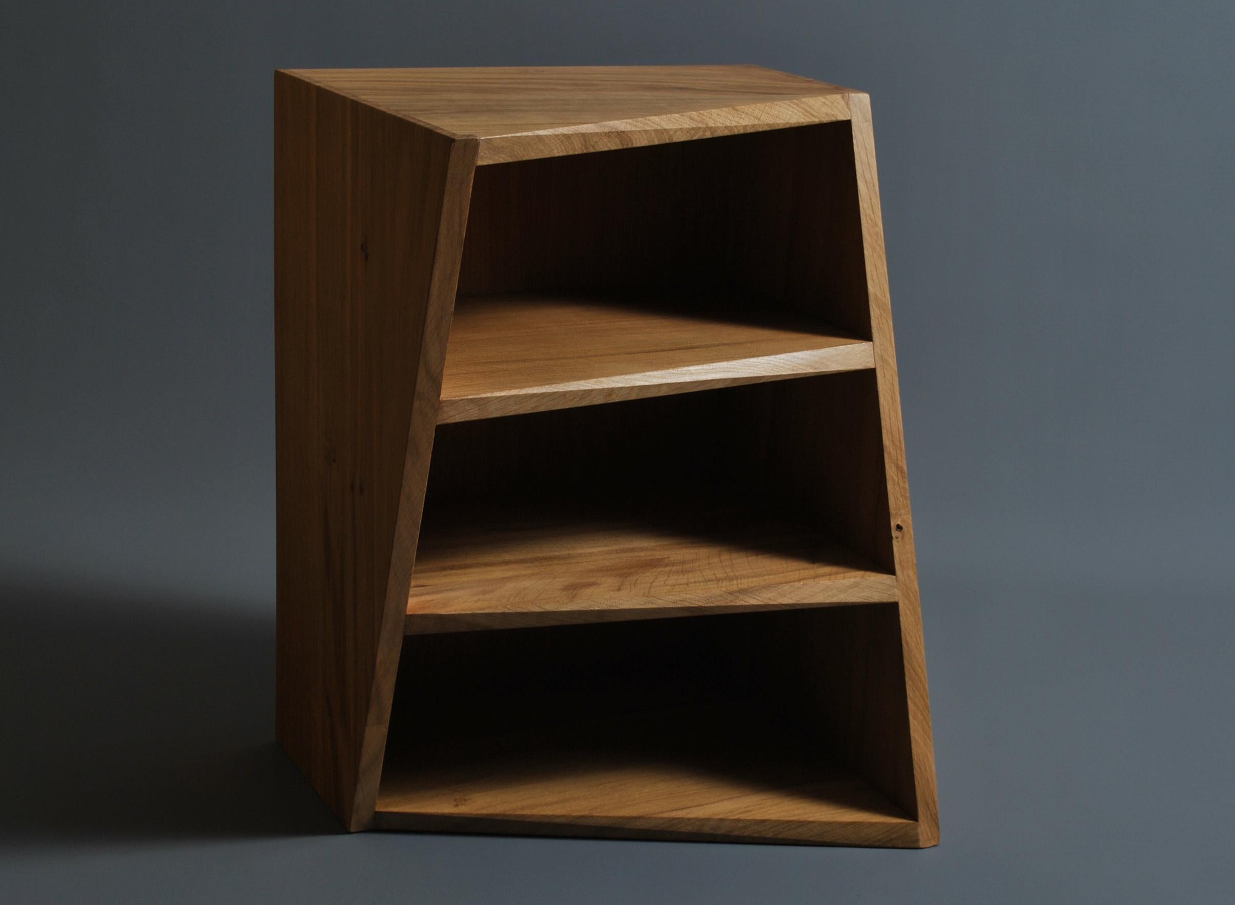 The Postmodern oak nightstands can be utilised as side or end tables/bedroom nightstands or shelves. The acute twisted angle design plays on the eye in a similar fashion to the Penrose and Escher staircase. The shelf fronts have a twisting bevelled