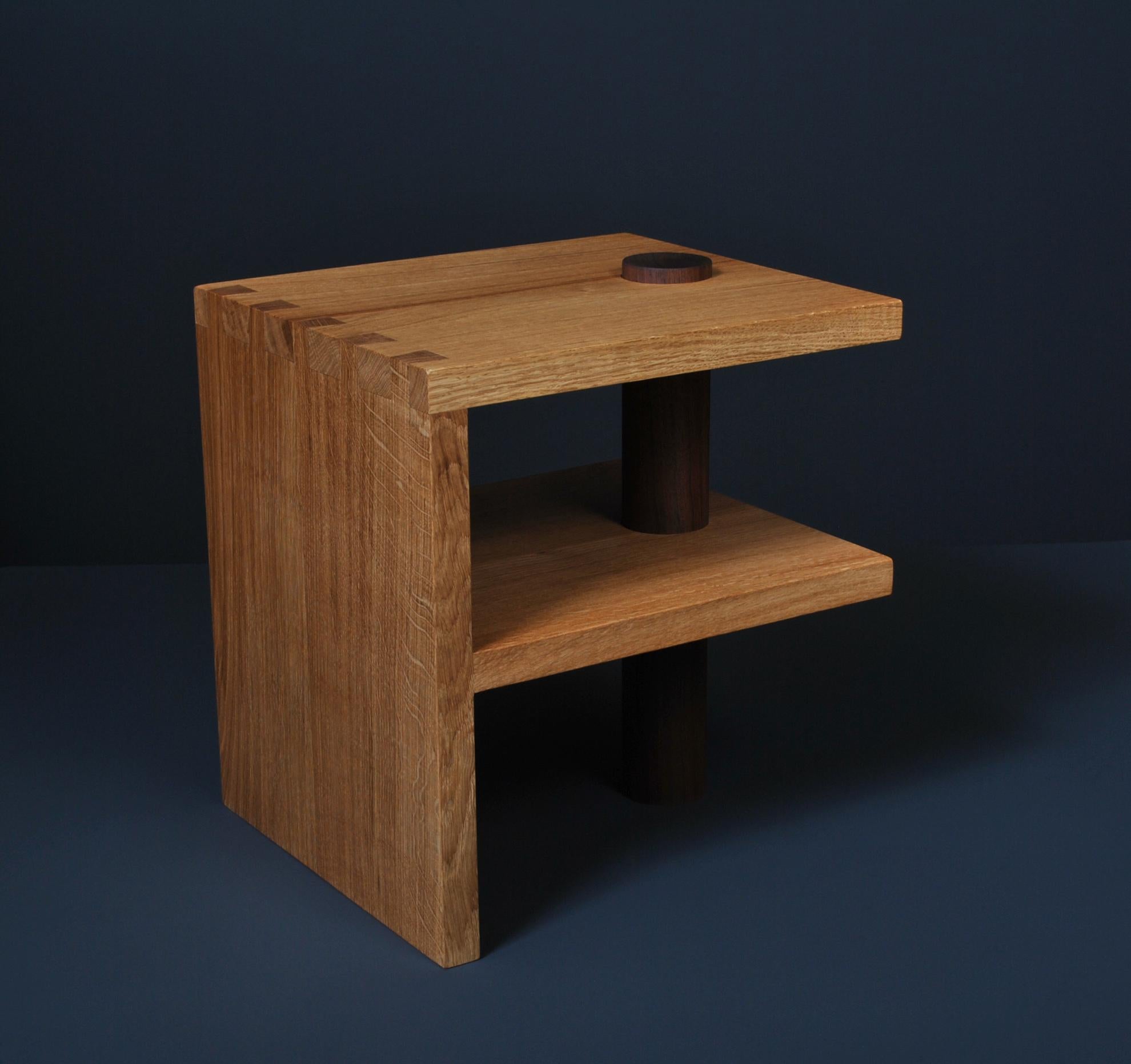 Architectural postmodern oak & walnut pillar end or side table. Designed by SUM furniture and handcrafted using traditional techniques from fully quartersawn English oak and American Walnut. Hand-cut large dovetail jointing with turned walnut