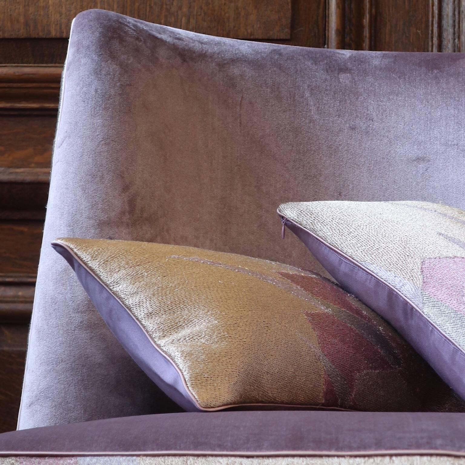 Handcrafted chair is a perfect occasional piece to add a touch of luxury to a living room or bedroom.
Designed with smooth curves and upholstered in hand embroidered pastel silk and metallic threads in shades of lilac, pink and pale