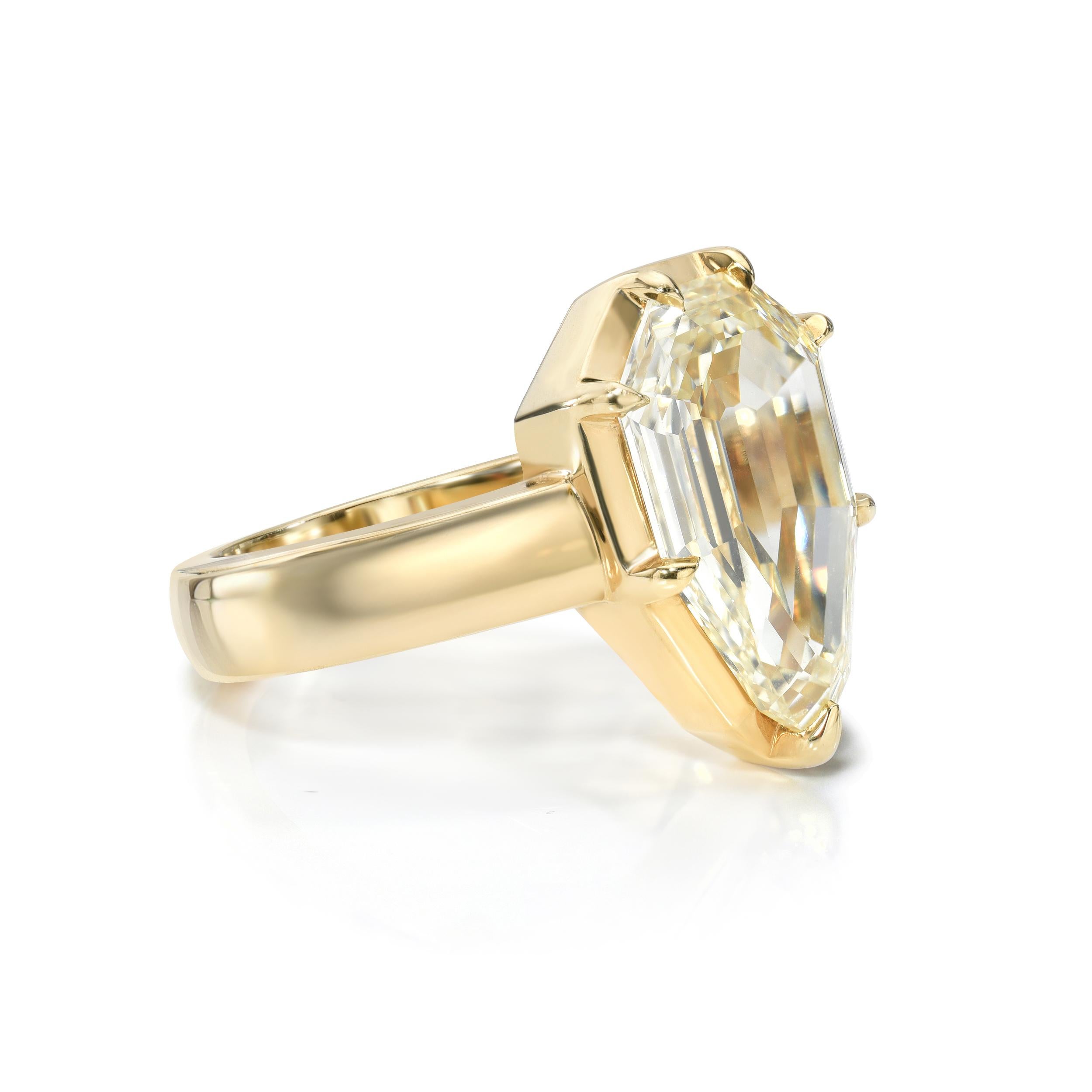 5.19ct Y-Z/SI1 GIA certified modified pear step cut diamond prong set in a handcrafted 18K yellow gold mounting.