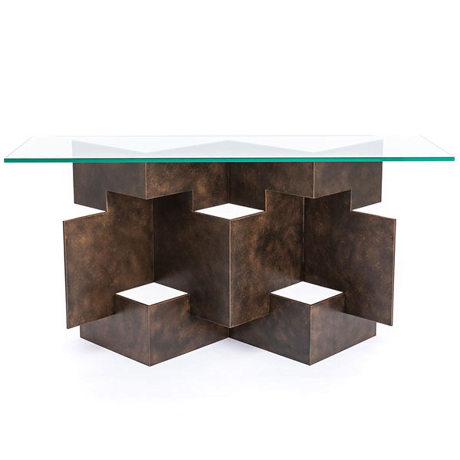Inspired by the ancient art of folding paper to create a 3D design, this table has been handcrafted using mild steel to create a geometric pattern of squares. Shown here in a hand-applied bronze finish with 15mm thick glass top.

Designed and