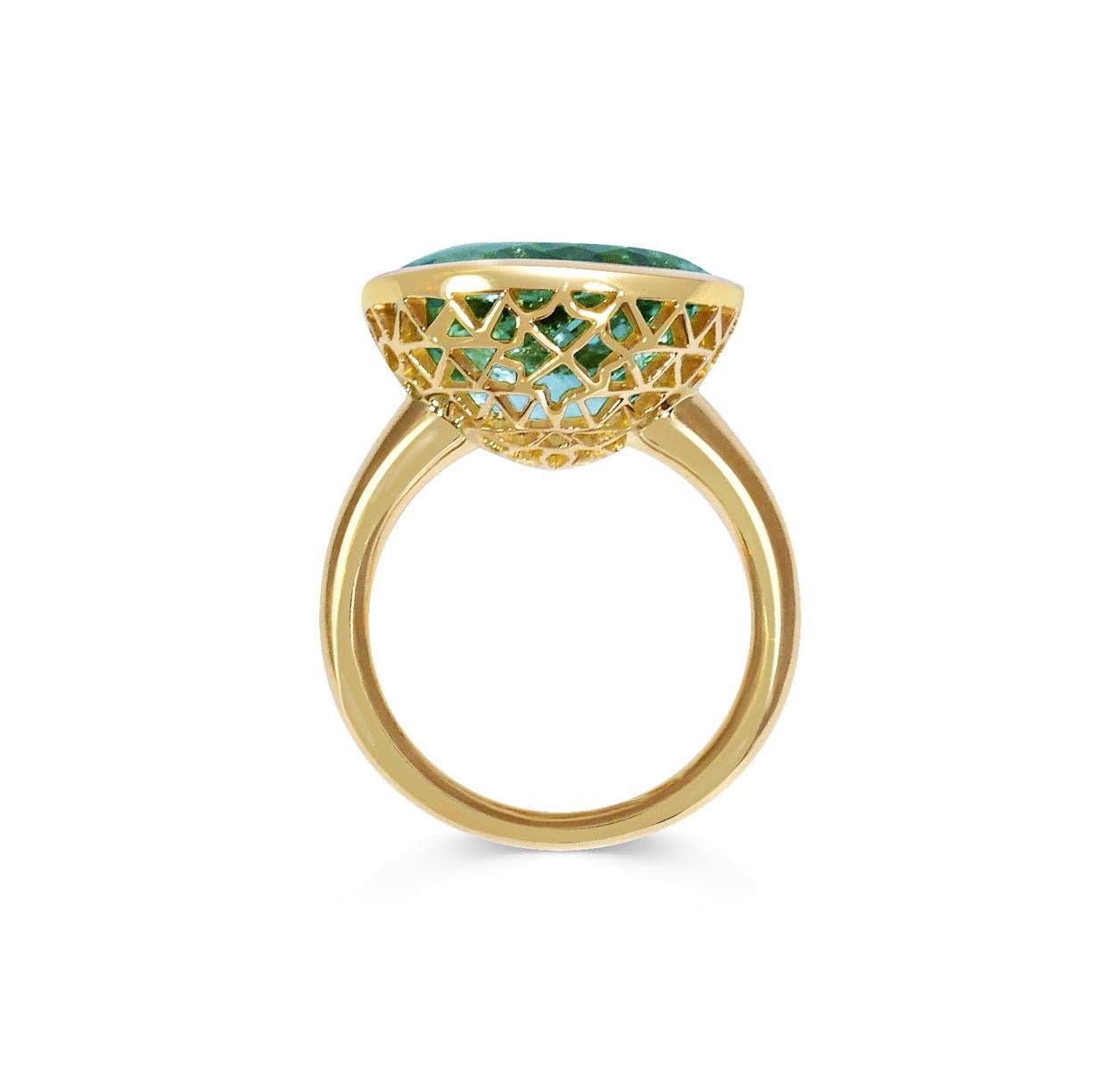 Handcrafted Oval Cut 9.17 Carats Aquamarine 18 Karat Yellow Gold Cocktail Ring. Our expert craftsmen hand pierce our iconic gold lace to fit each stone on a tapered band making each ring One of a Kind. This unique technique, inspired by our