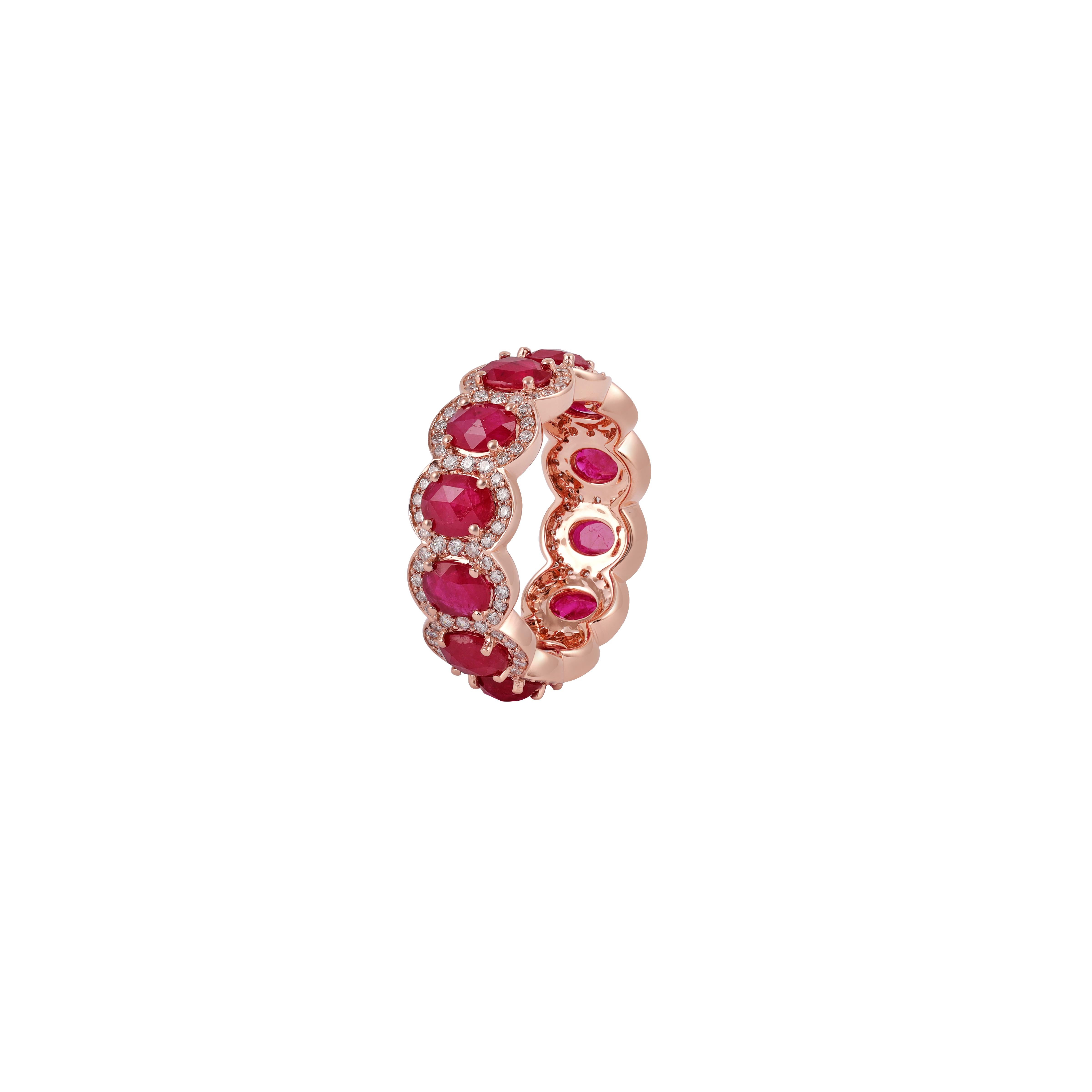 Handcrafted Oval Ruby Band with brilliant round cut Diamond 
12 Oval Ruby - 4.14 CTS
156 Brilliant round cut Diamond - 1.01 CTS
18 Karat Rose Gold - 6.2 Grams
