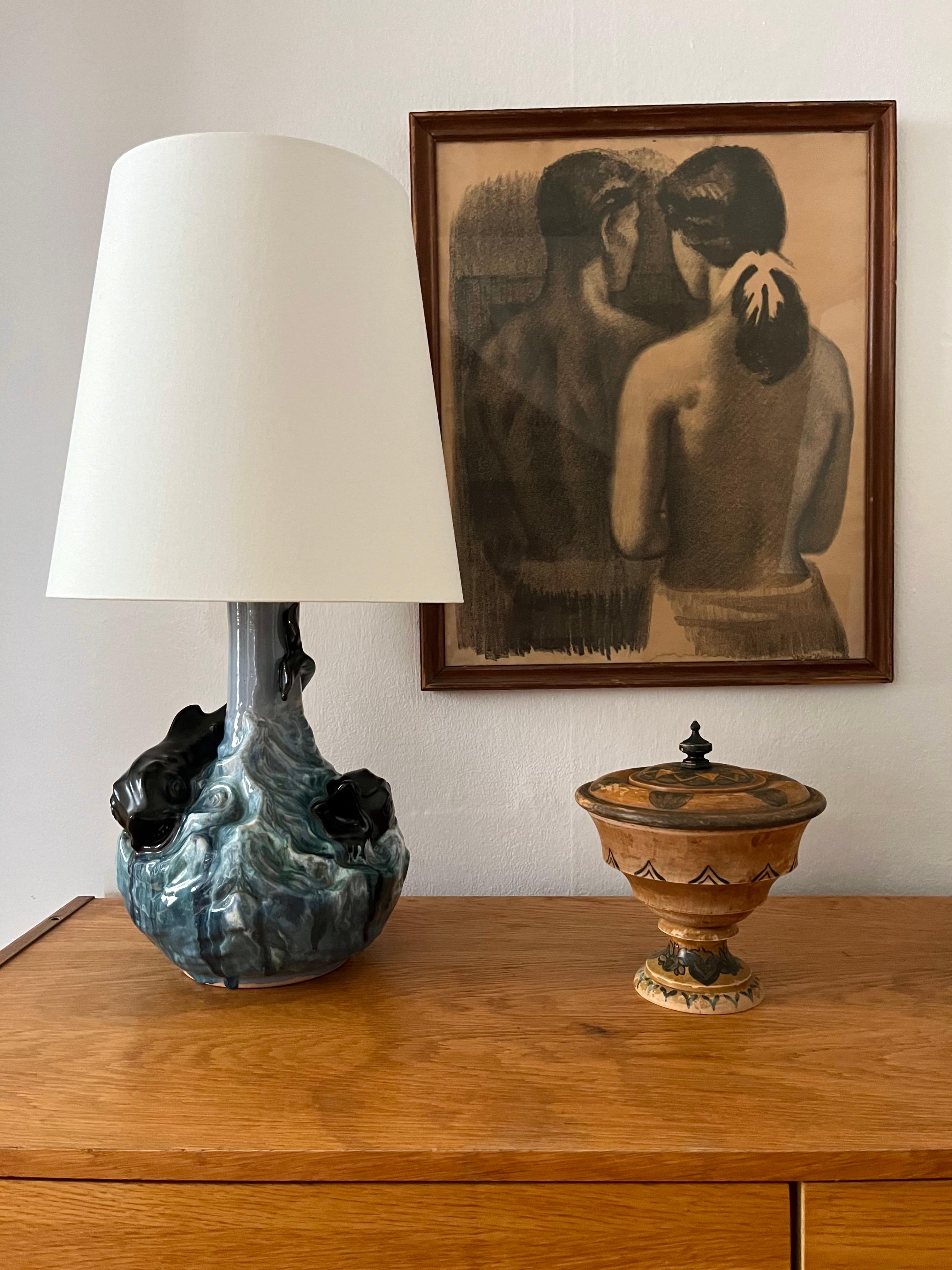 Handcrafted Painted Wooden Lidded Bowl in Art Nouveau Folk Style, Denmark, 1930s

Decorative hand-turned and hand-painted wooden lidded bowl from the 1930s–1940s, blending Nordic folk art with Art Nouveau influence. The surface is adorned with