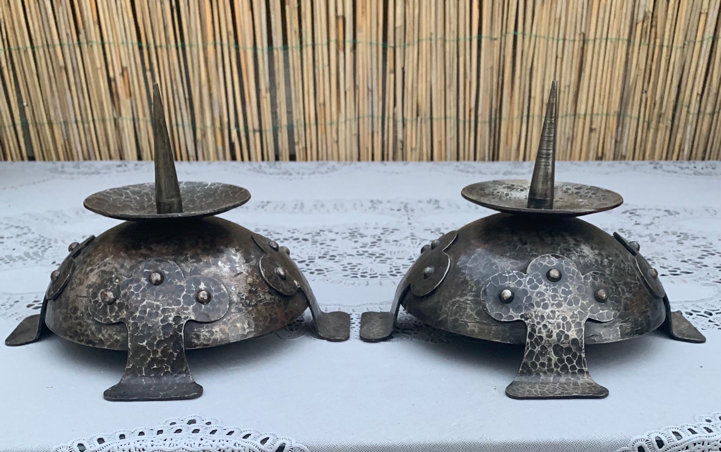 Beautiful and very stylish pair of Gothic candlesticks made in the Arts and Crafts era.

If you are looking for rare and good quality antiques in the Gothic style to grace your living space then this hand forged and timeless pair could be yours to