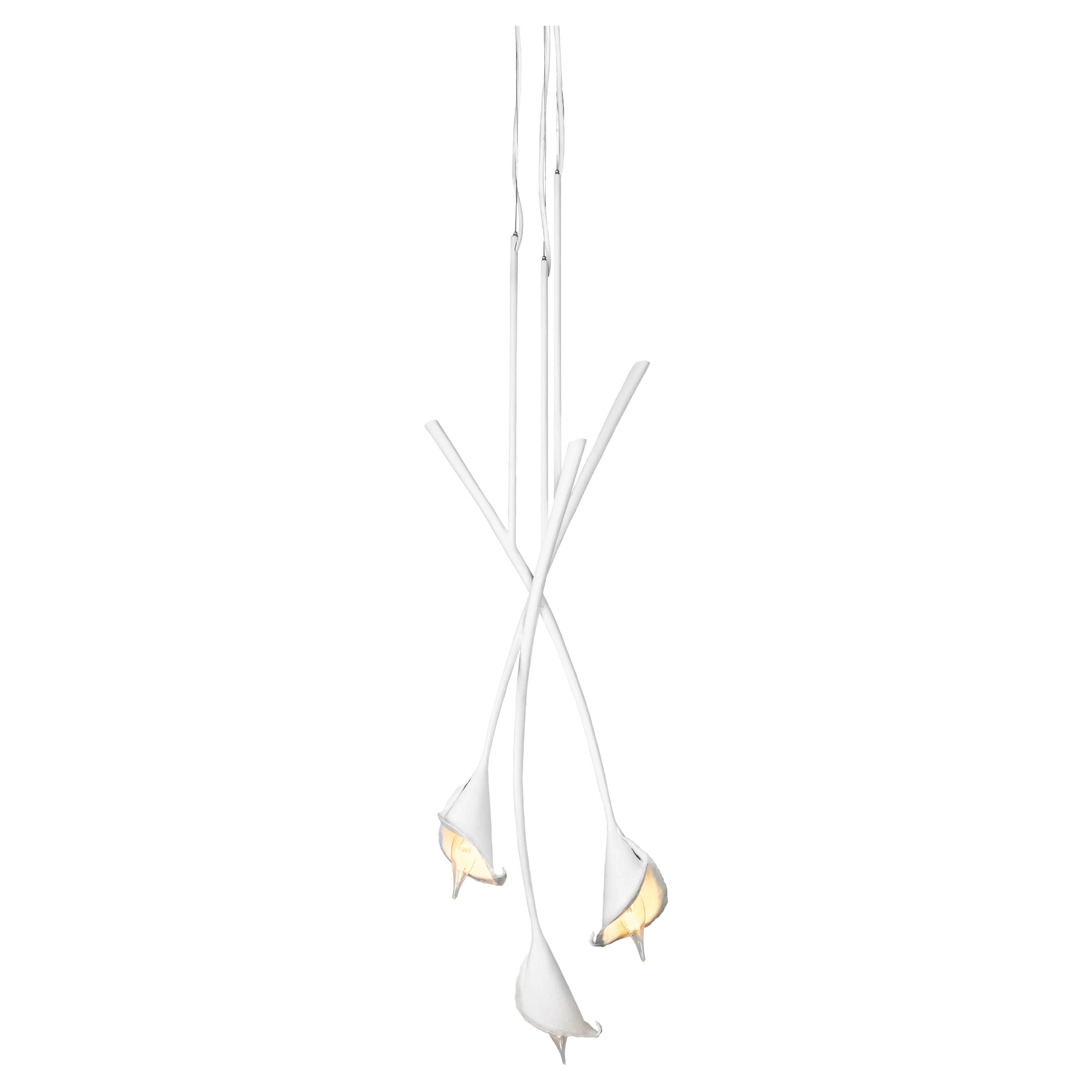For a large space in need of a signature lighting object, the Calla Lily Chandelier is a good option. It sets out to dominate through its sheer size and form.
Hand-sculpted  in white plaster, you can use them by itself or combine them to fit your